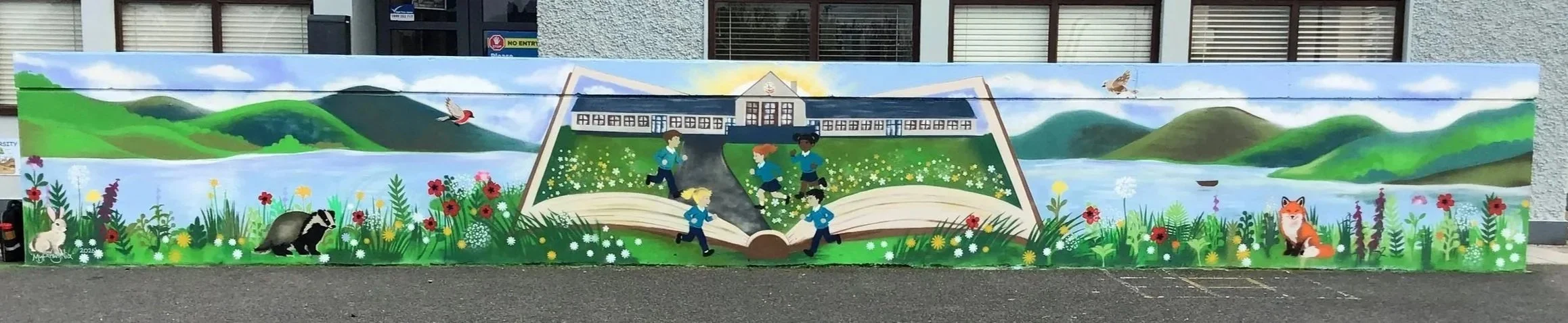 2026 This collaborative school mural was created with Fourth Class pupils at St Brigid’s National School, Drumcong, as part of the BLAST Arts in Education Residency programme. Inspired by the school’s location between Lough Scur and Carrickaport Loug