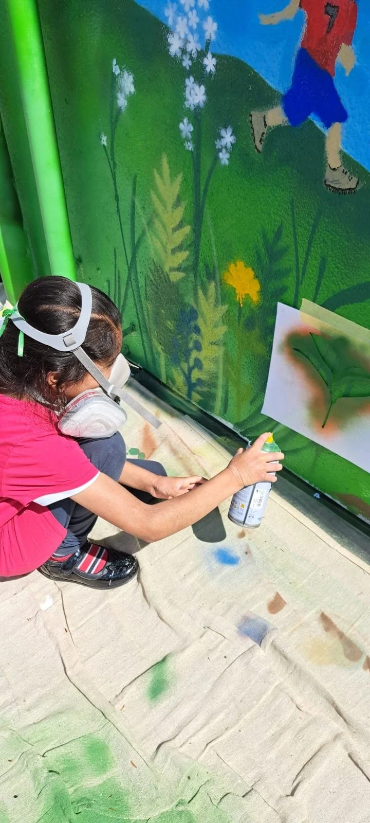 Spray painting the wild grass stencils 2.jpg
