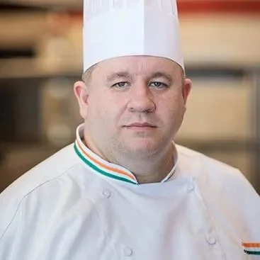 Headshot of CIA chef Matthew Ona