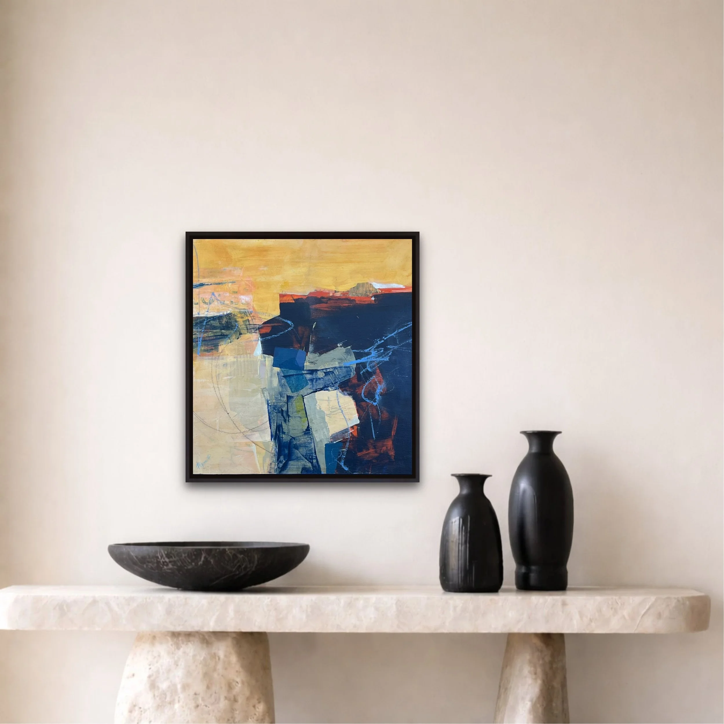 Yellow and blue abstract landscape painting hanging above entry table.