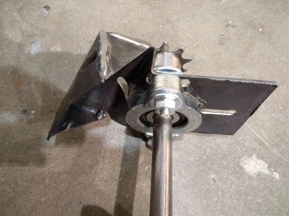 Deformed Sprocket Axle Mount.jpg