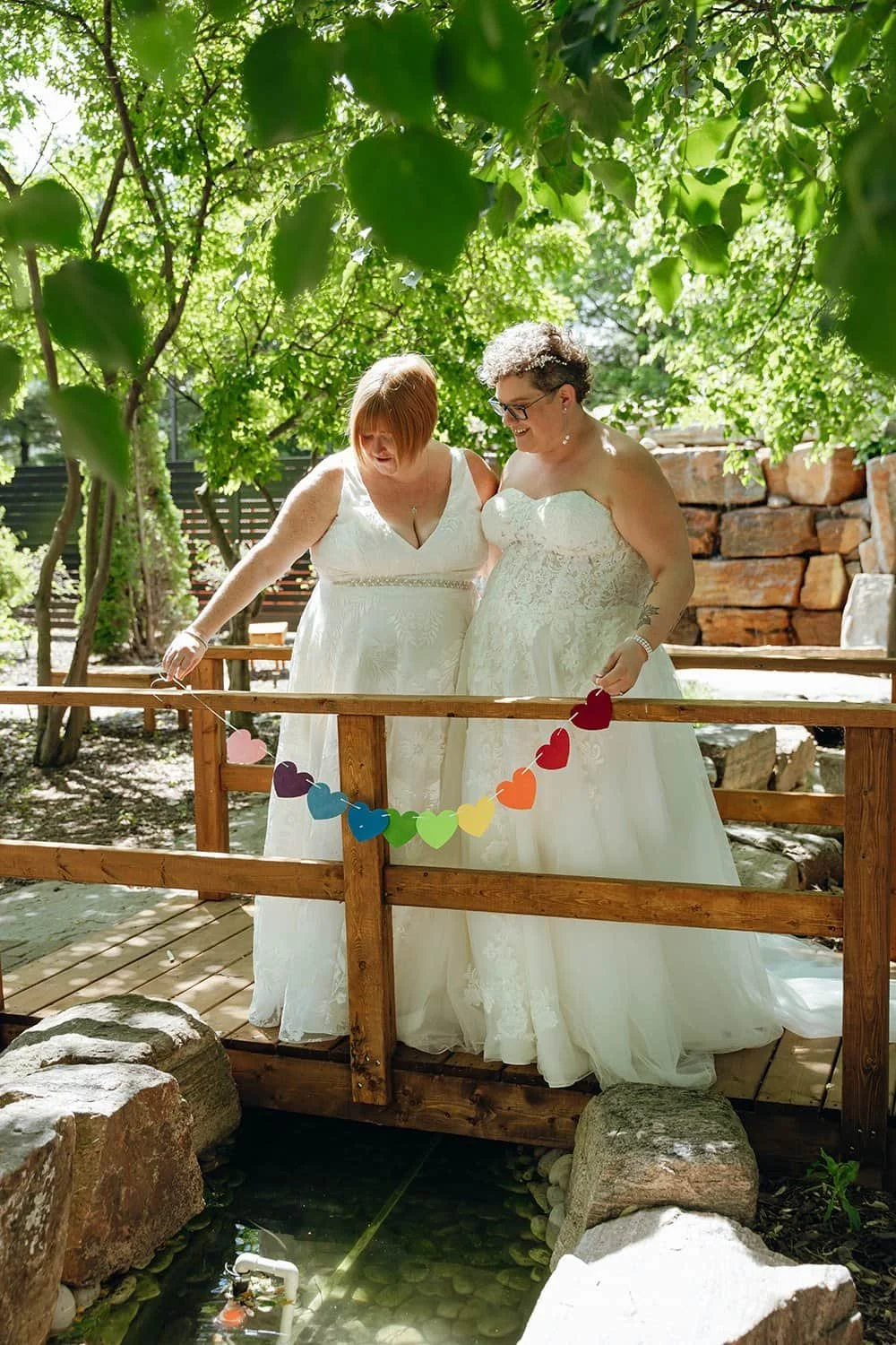 LGBTQ+ couple sharing a candid moment during documentary-style Hamilton, Ontario wedding photography
