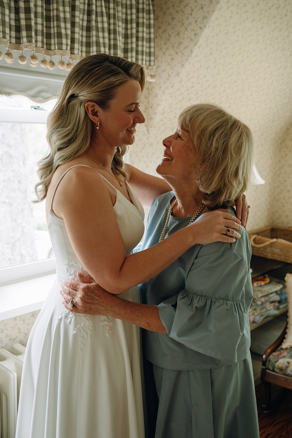 Mother and daughter embracing at an intimate Toronto wedding