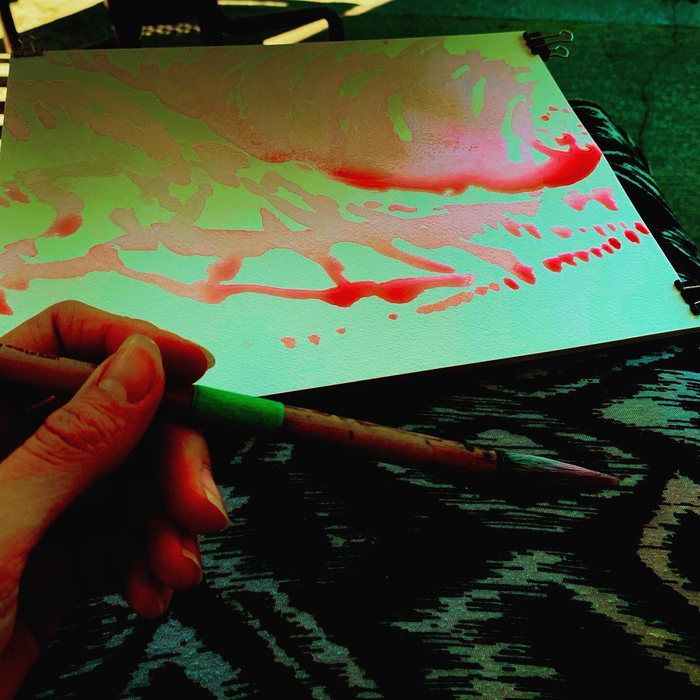 Outside painting in the green of my parent&rsquo;s garden and the colour of red and orange pull me the strongest: the blood that was spilled of our precious First Nations and their cherished children and the wildfires that are now ravaging the land a