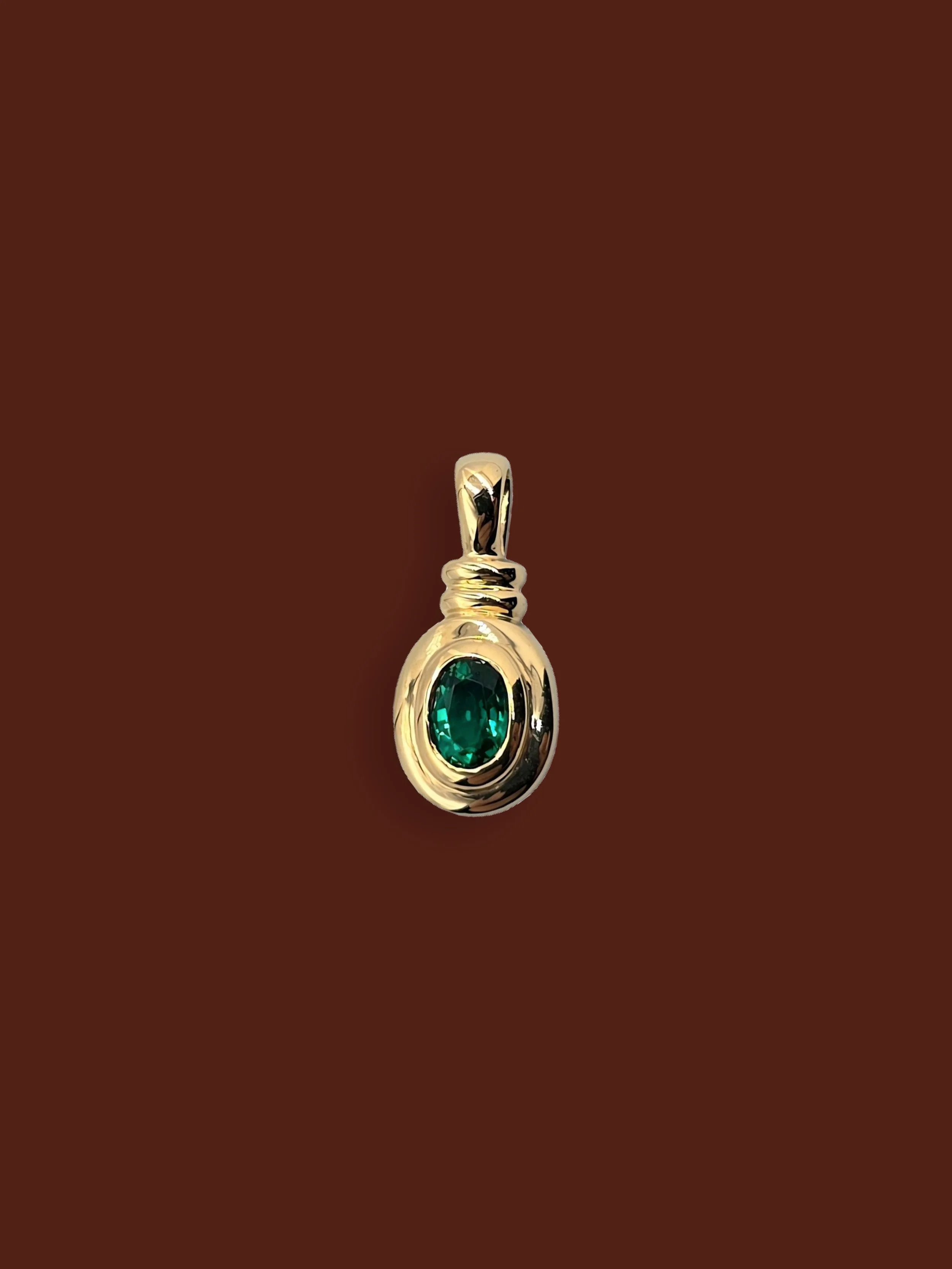 Plain Oval Emerald Pendant.jpg