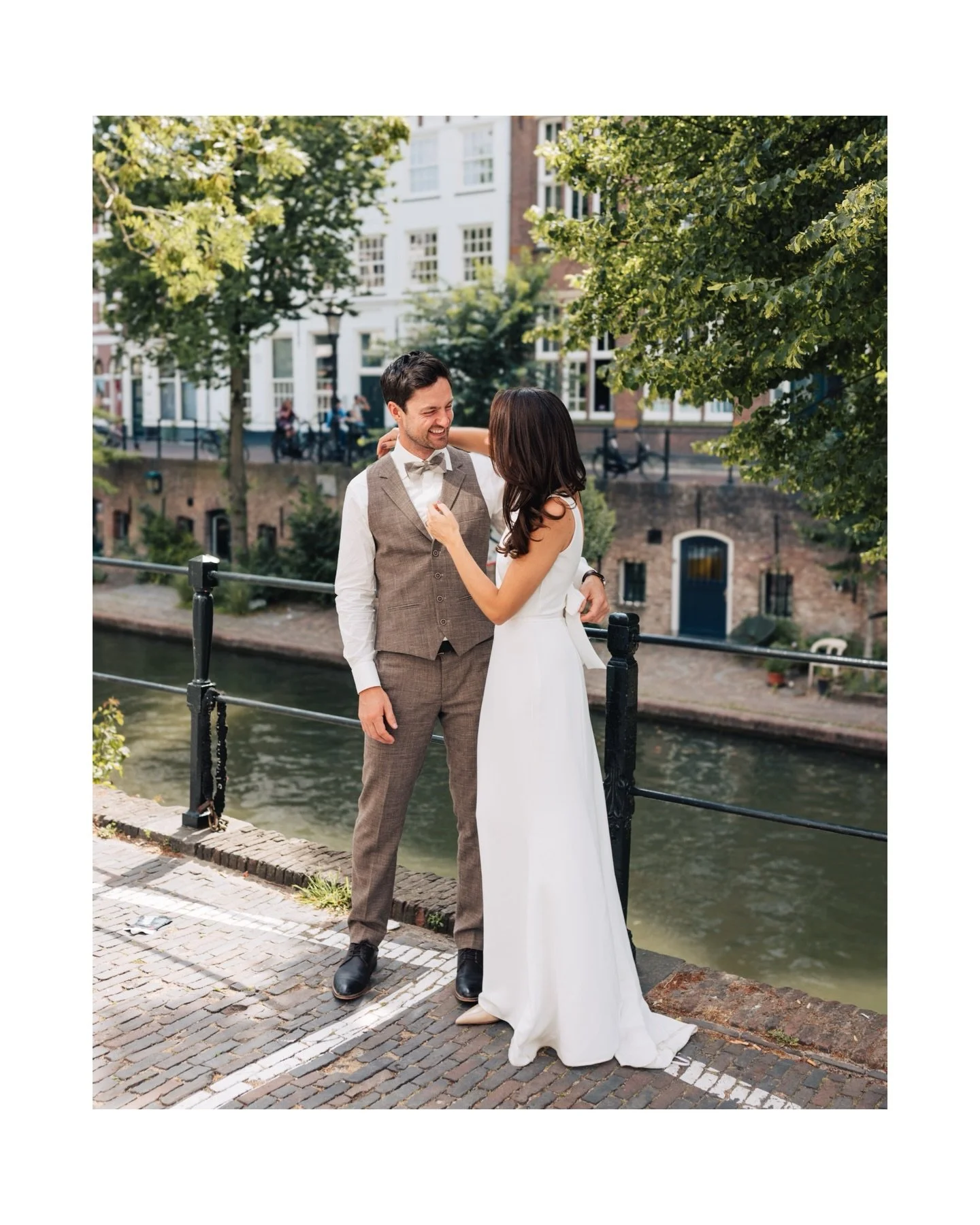 Lisa &amp; Rens, freshly married 💍 on their way through Utrecht&rsquo;s city center to their wedding dinner.