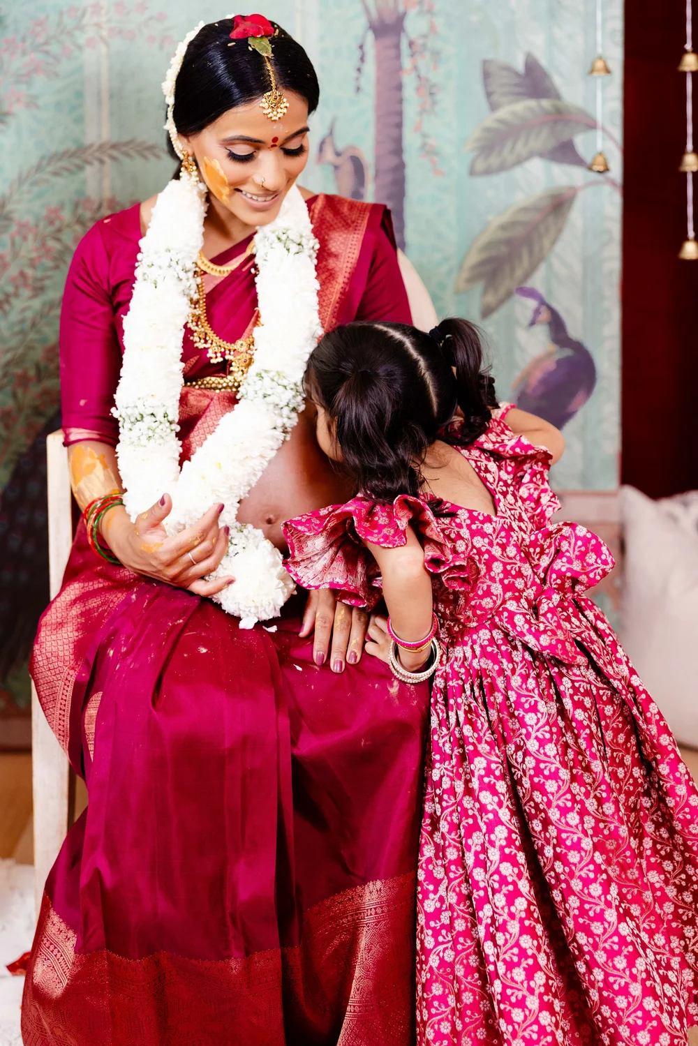 Mother and daughter in traditional dress at a Toronto celebration