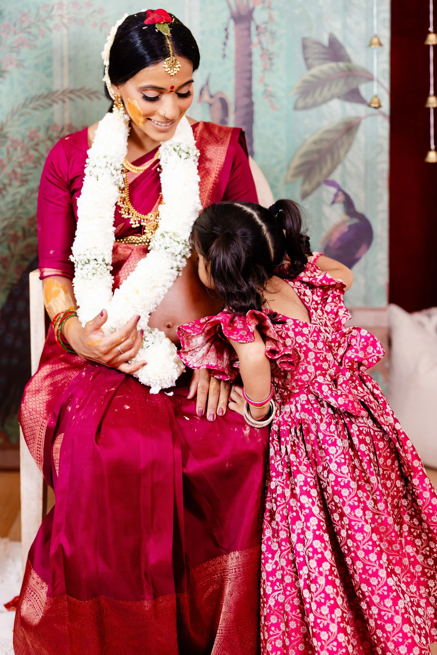 Mother and daughter in traditional dress at a Toronto family ceremony
