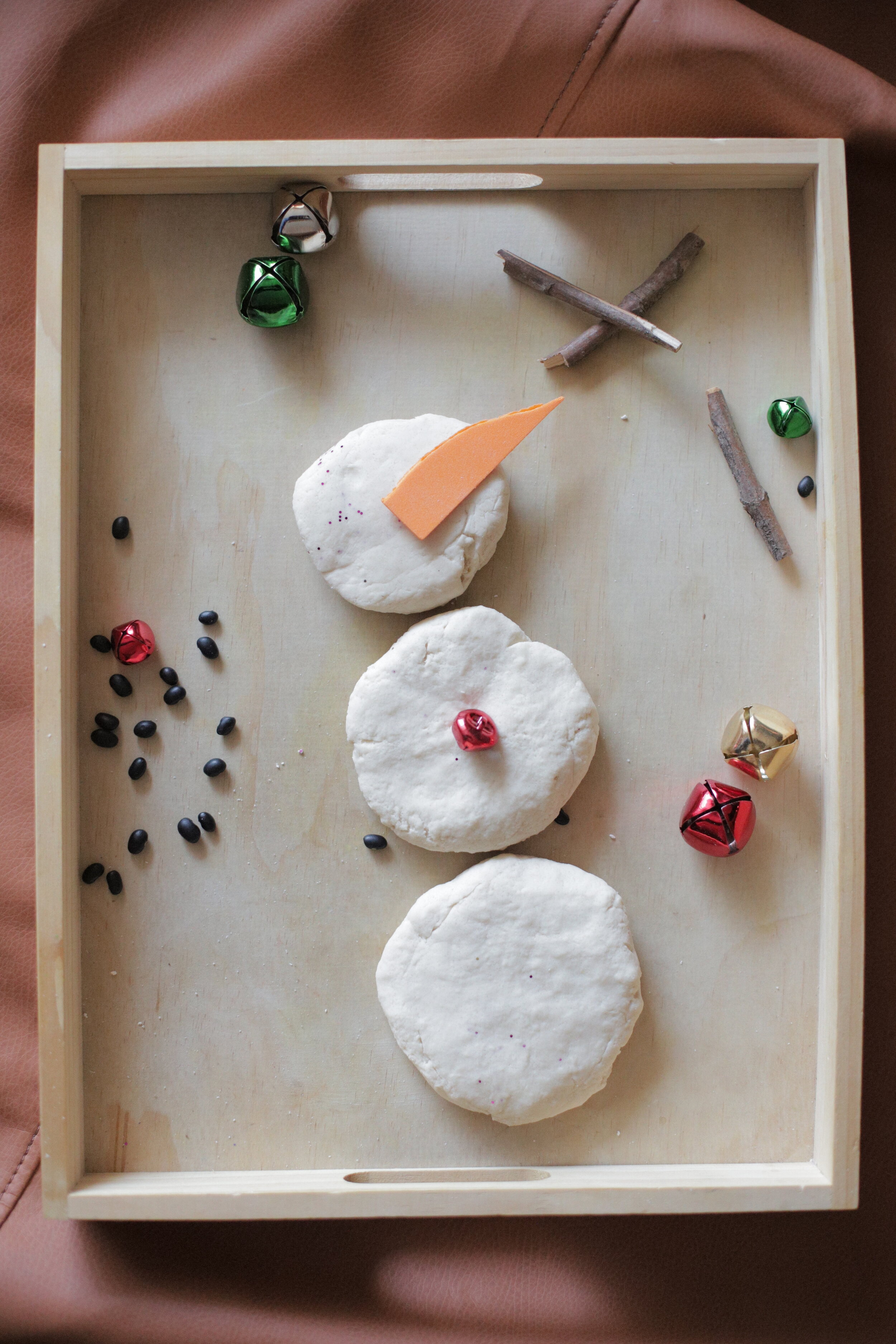 Objective: Create and build a snowman with the materials provided.