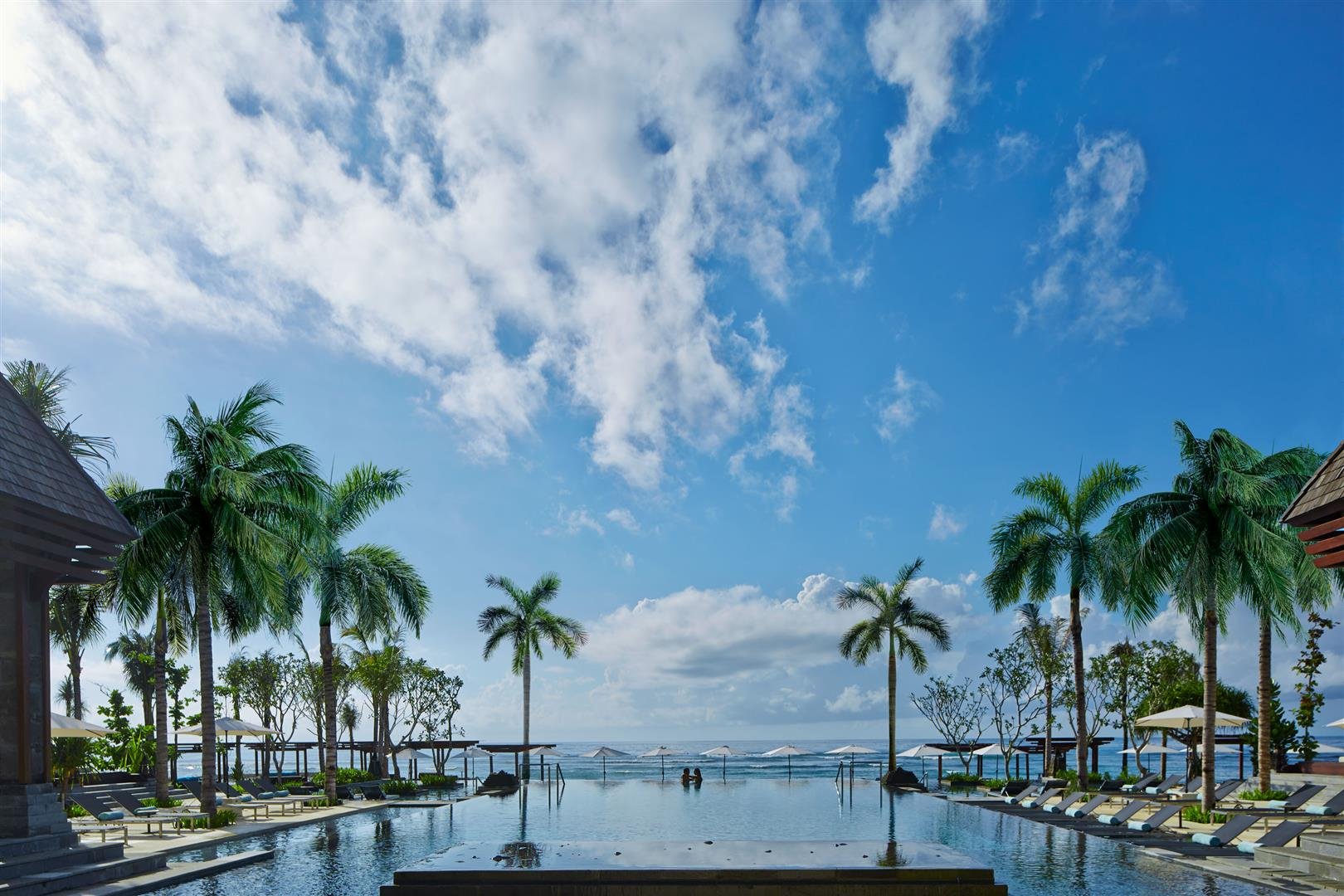 The Ritz-Carlton, Bali - Main Pool with Model 1 (1).jpg