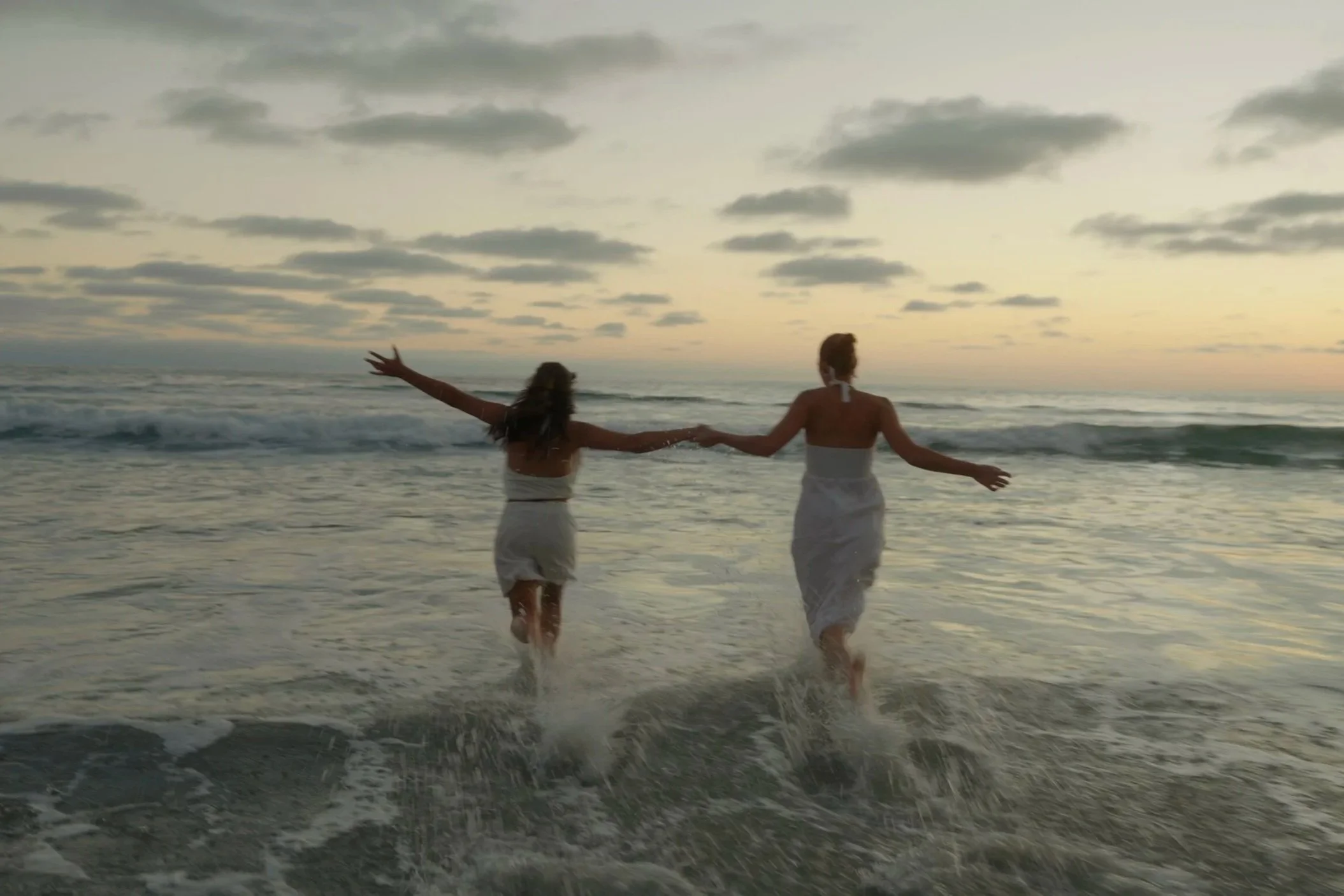 queer lesbian wedding in southern california, san diego county multi-day wedding, jumping in the ocean water, romantic vows, love story