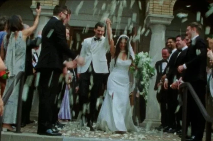 greek orthodox church downtown columbus wedding, exiting the church with flower petals and celebration, classy wedding video