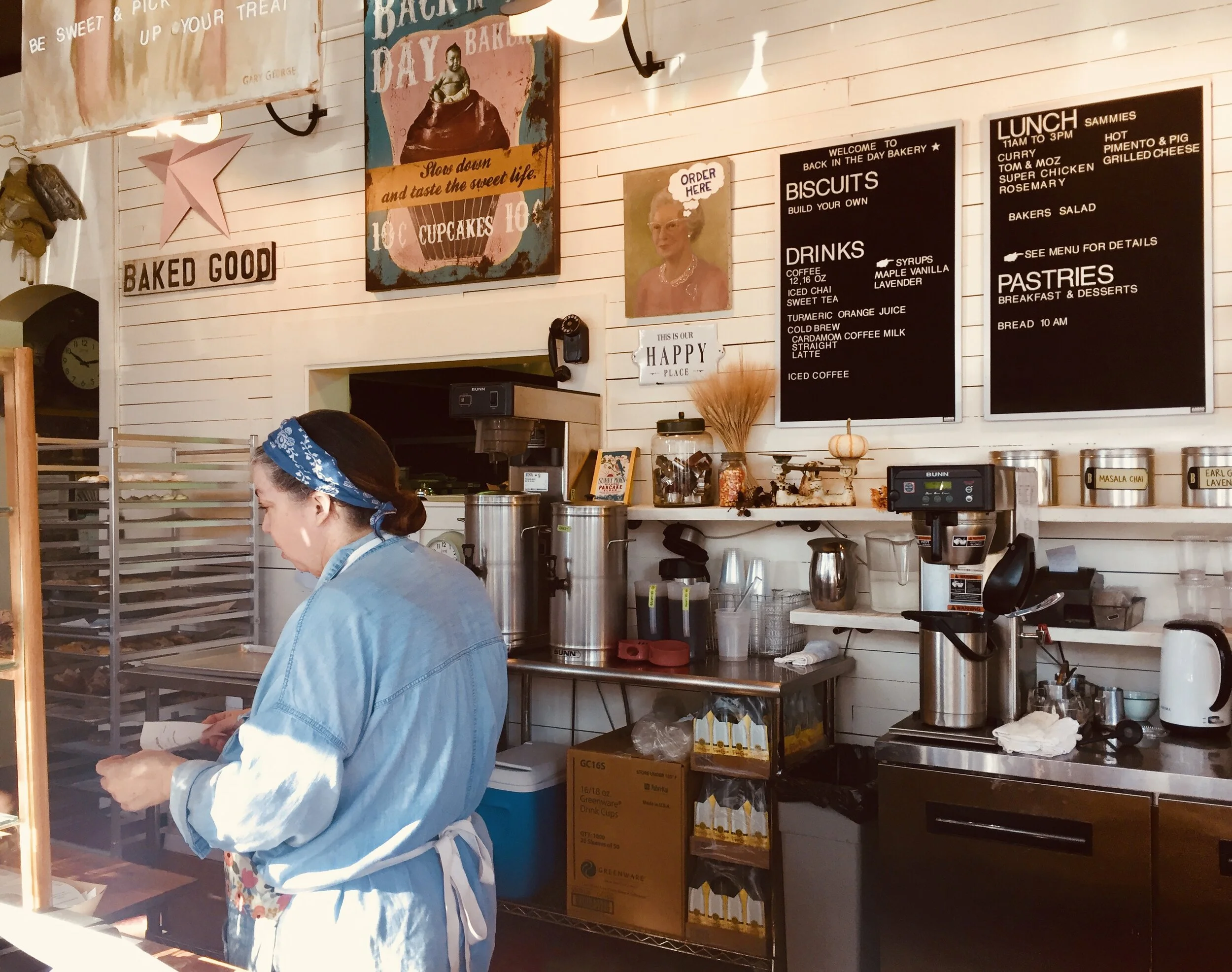 The proprietor sorts through orders at biscuit heaven.