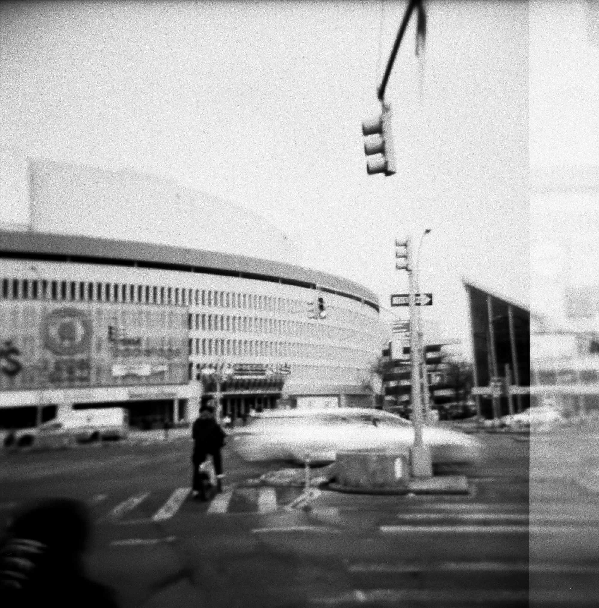   the queens place mall as seen from queens boulevard. the architecture of the surrounding block was inspired by the world’s fair held about a mile-and-a-half away in nineteen sixty-four  