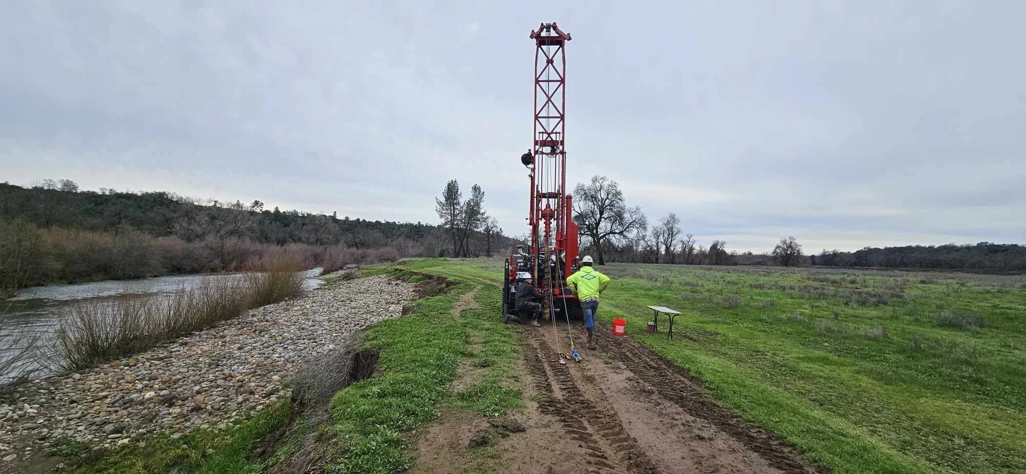 Environmental fieldwork with drilling rig near river
