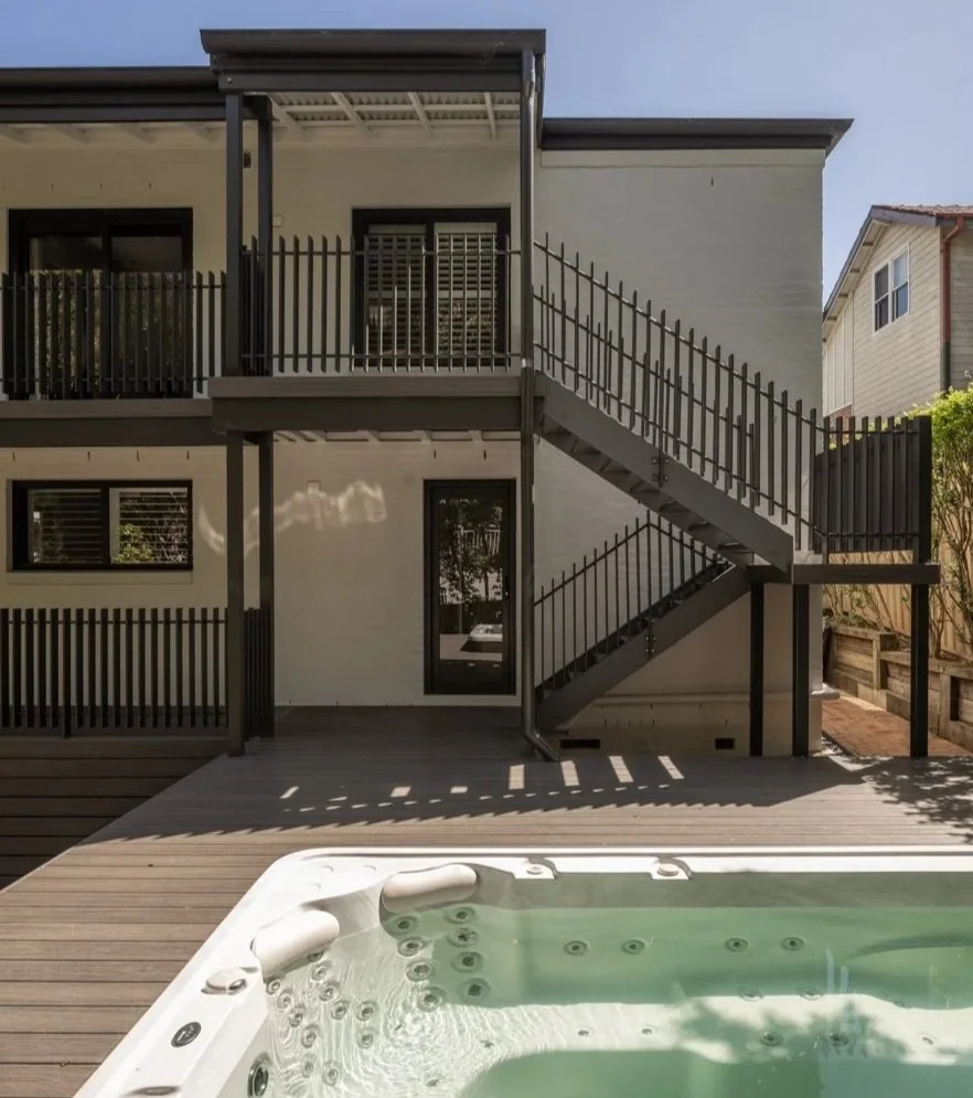 the transformation continues back of house with the inclusion of new balustrading and a hot tub.