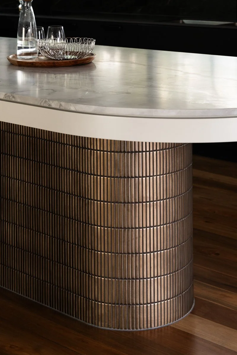 A kitchen island that feels more like an elevated peice of furniture. 