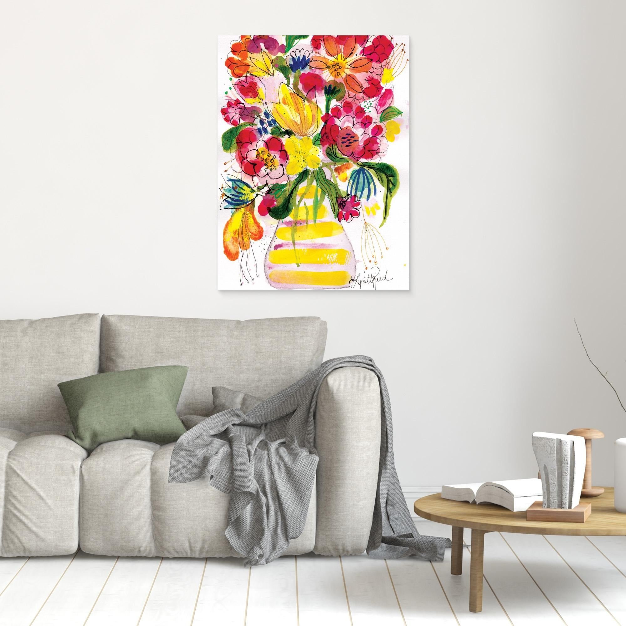 Yellow Striped Vase With Bright Blooms canvas art print by Lynette Reed shown framed in a room setting