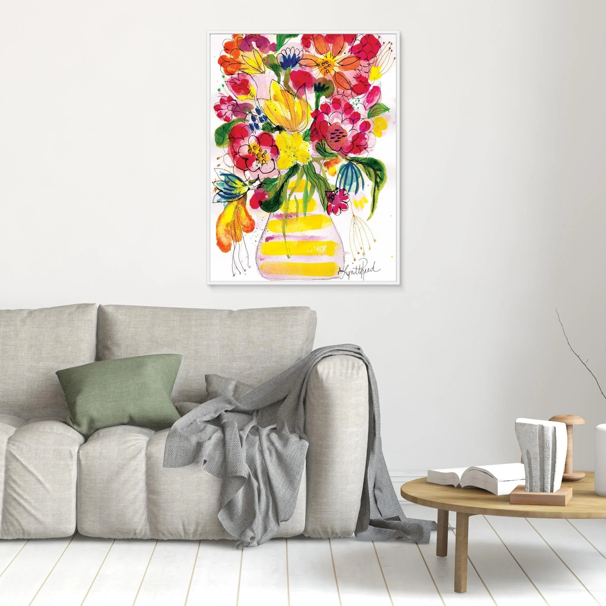 Yellow Striped Vase With Bright Blooms canvas art print by Lynette Reed shown framed in a room setting