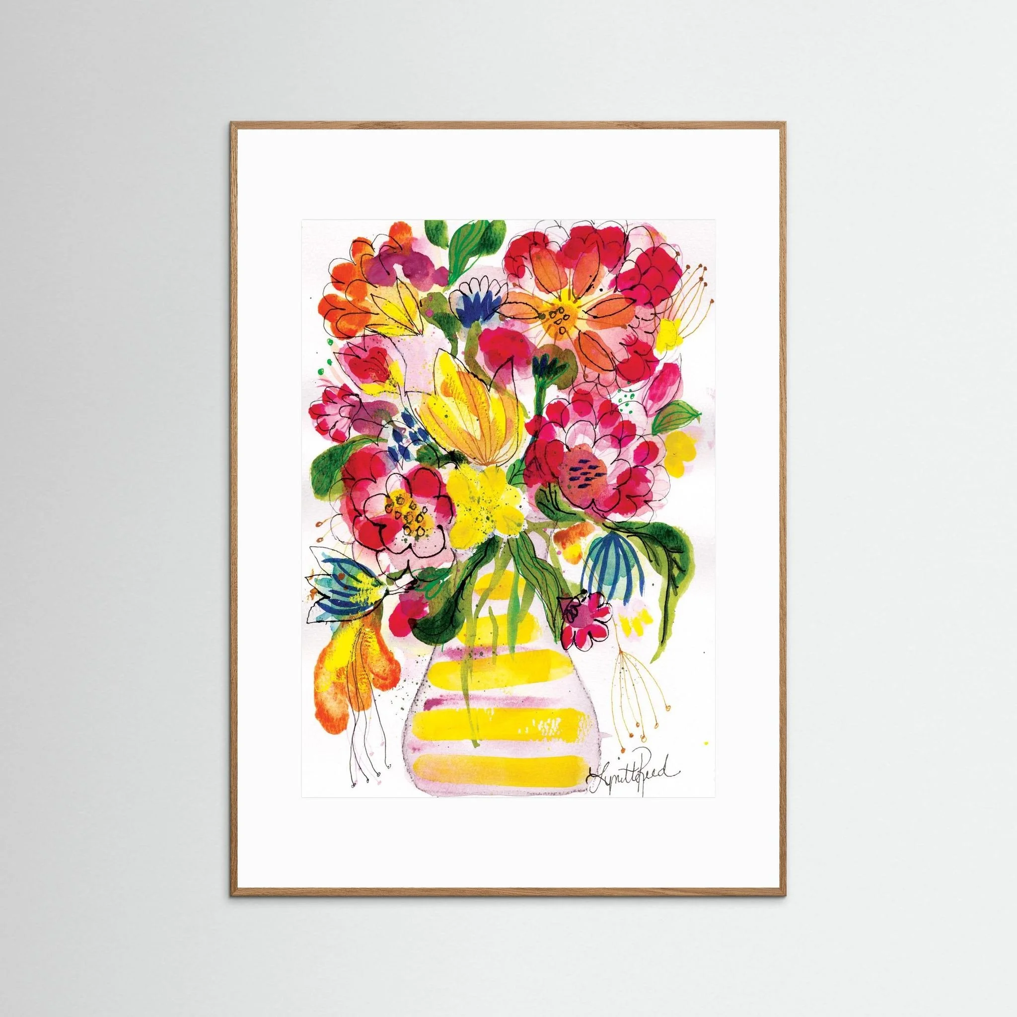 Yellow Striped Vase With Bright Blooms art print on paper by Lynette Reed shown framed in a room setting