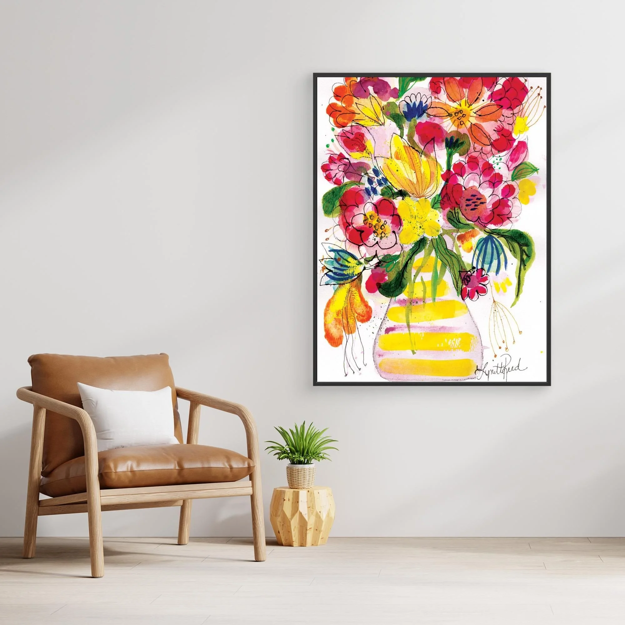 Yellow Striped Vase With Bright Blooms canvas art print by Lynette Reed shown framed in a room setting