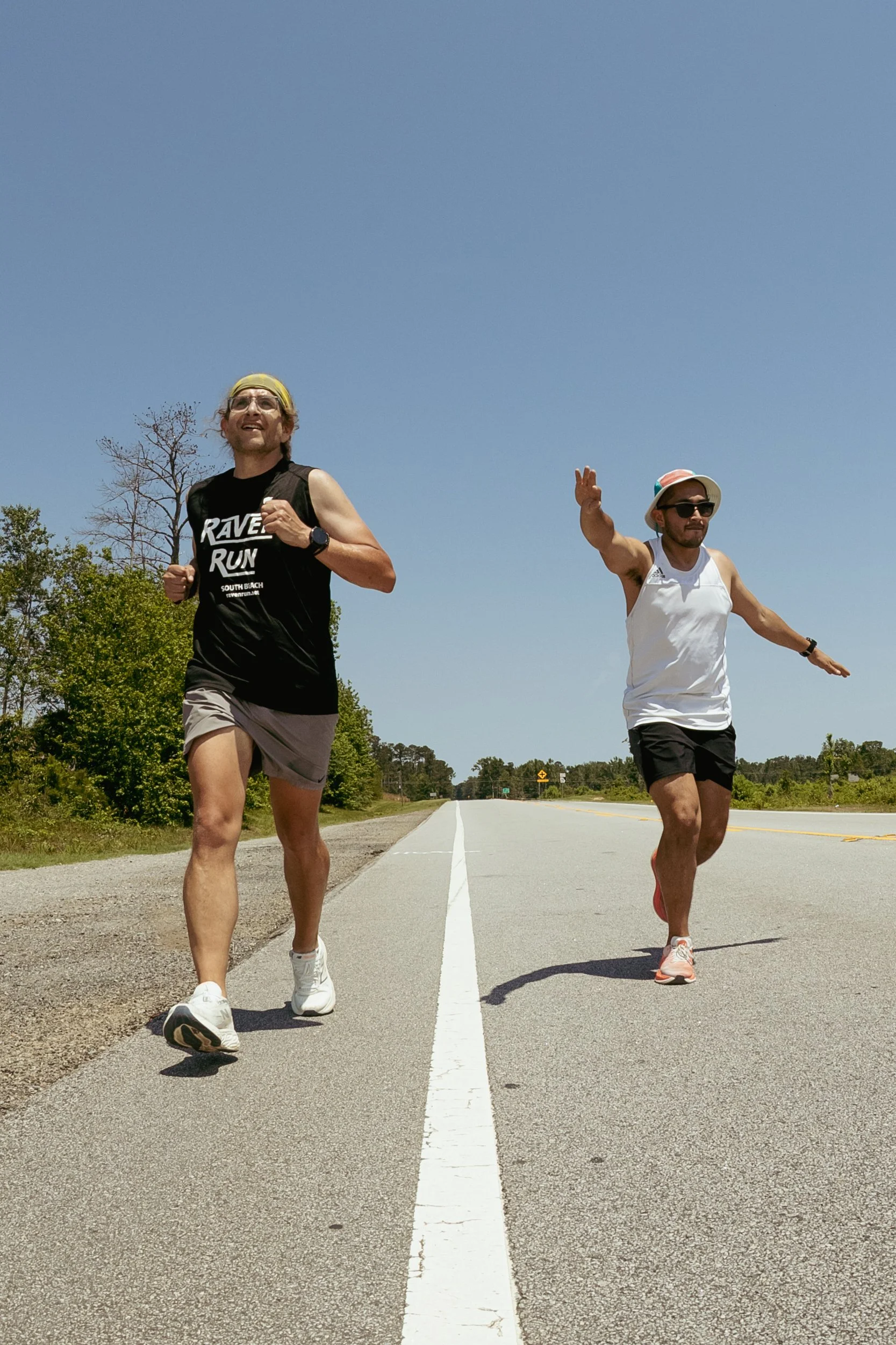runners on white line portrait.jpg