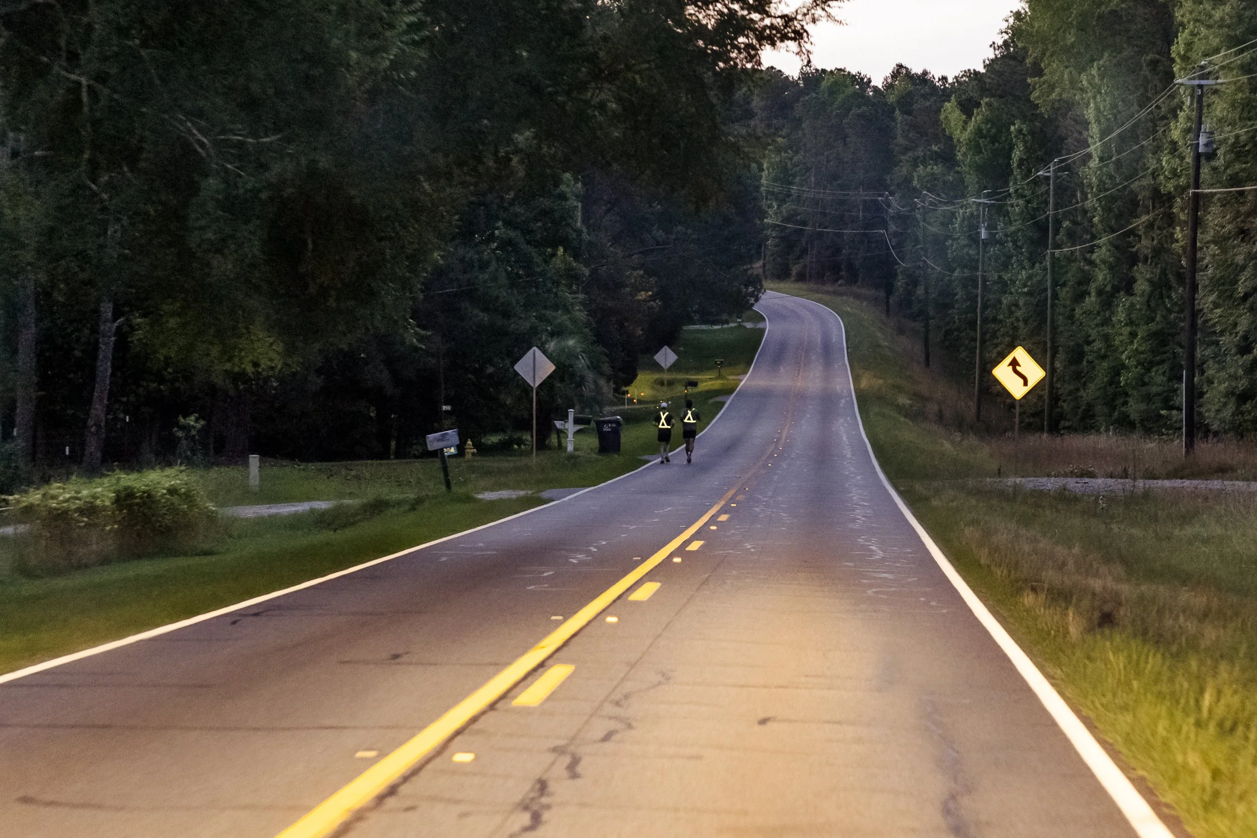 runners long quiet road at dusk.jpg