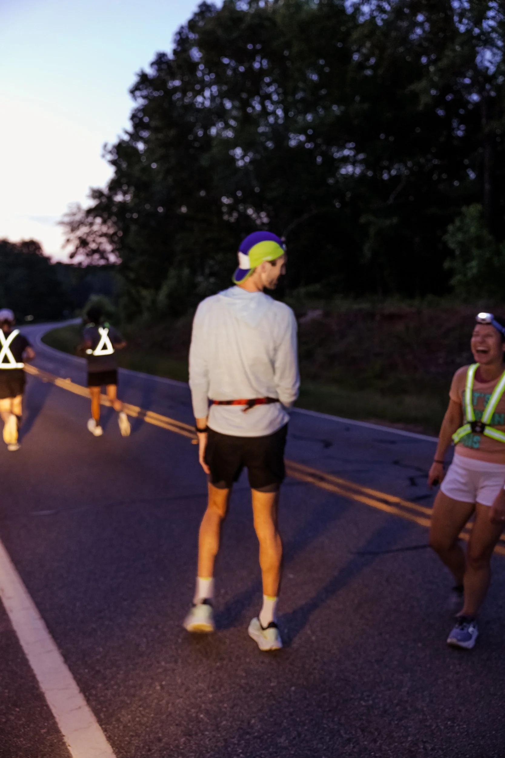 blurry night runners laughing.jpg