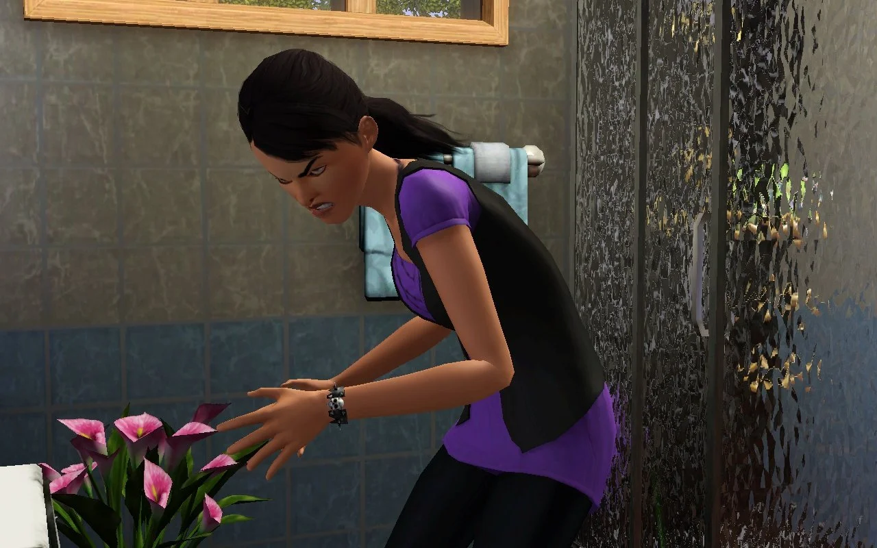Young Adult Sim Dorothy Button glaring with an evil expression: eyebrows extremely angled and gritted teeth. She is standing in a bathroom, slightly hunched over with her hands a little in front of her; one wrist has a bracelet with a skull centerpiece.
