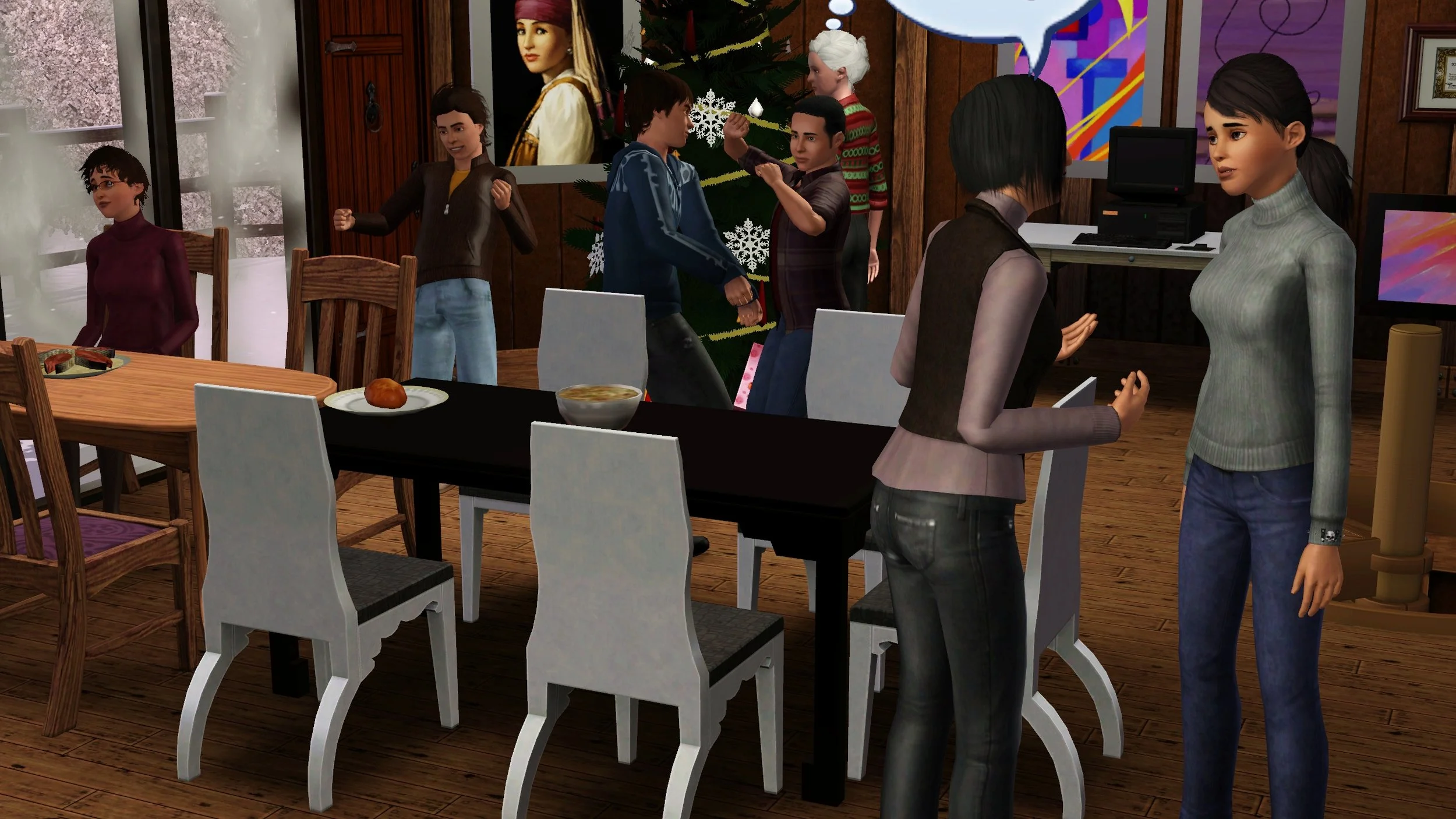 Colette speaks to Dorothy; 2 dining tables are set up end-to-end behind them, with group servings of stew, bread and salmon set out. Ryker, Chase and Mason dance between the Christmas tree and where Aria sits at the table, by large frosted windows.