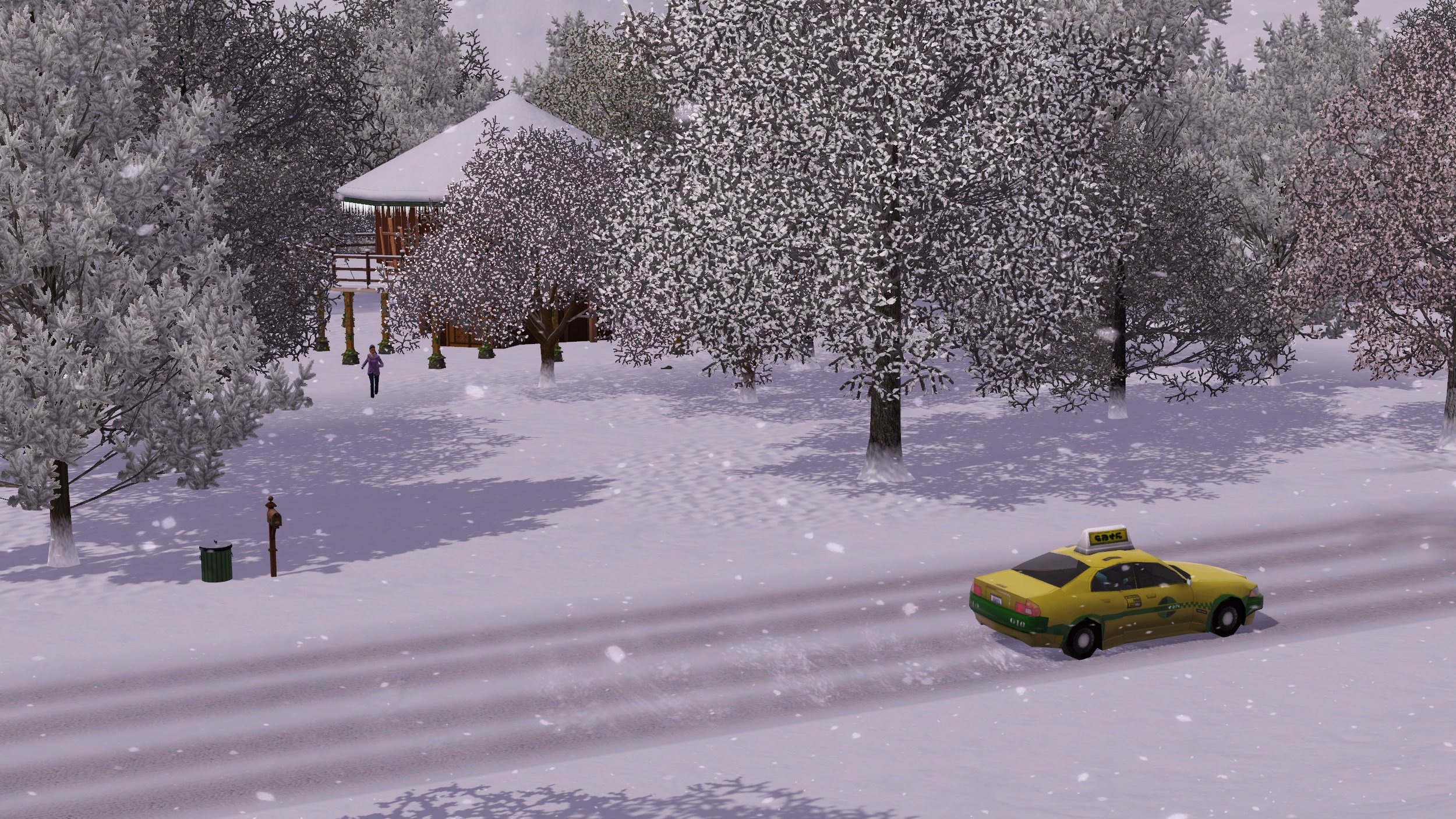 A yellow taxi on a snow-covered road on a cloudy day with large fluffy snowflakes falling. A two-storey building is somewhat hidden by snow-covered bare trees. A Sim in a puffy jacket is running from near the house.
