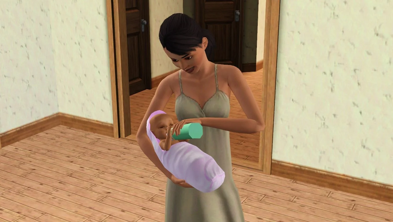 Dorothy bottle feeds baby Mara in the front room of Button Ranch. Dorothy is still in her maternity dress; Mara is swaddled in a pink blanket.