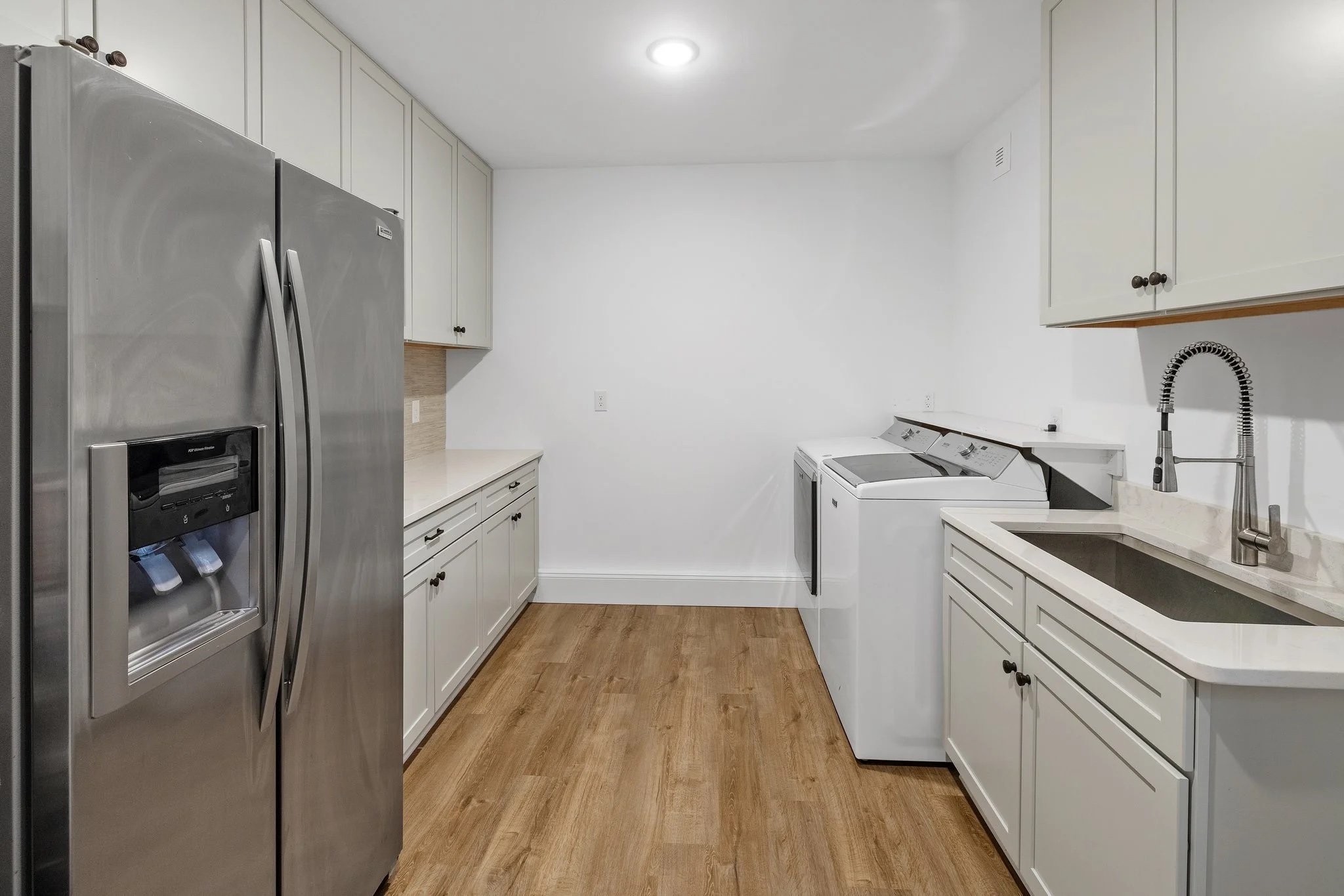 Imagine having a little extra square footage&hellip;would you choose a new laundry room? Extra storage? A second fridge?

With this Midlothian addition, our clients didn&rsquo;t have to choose - they got it all.
.
Photographer: @tourvirginiahomes 
.
