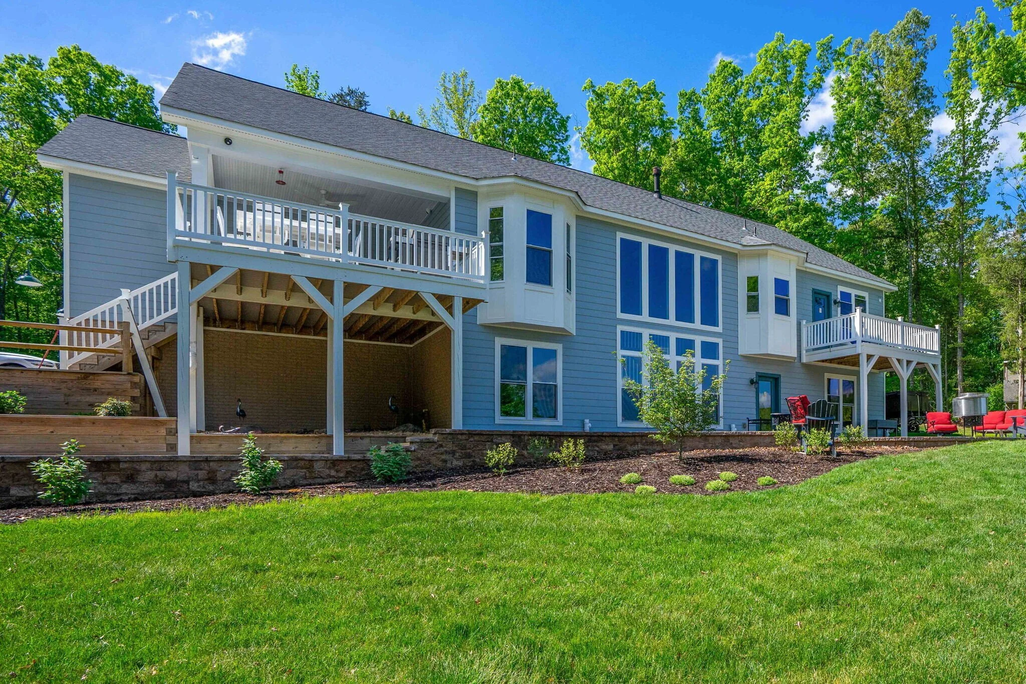 The rear exterior of the Lake Anna project is all about the views and they&rsquo;re pretty incredible all around!
.
Designer: @leewatersdesign 
Photographer: @leewatersdesign 
.
Lake Anna Remodel | Lake Anna Homes | Lake Anna Builder | Richmond Home 