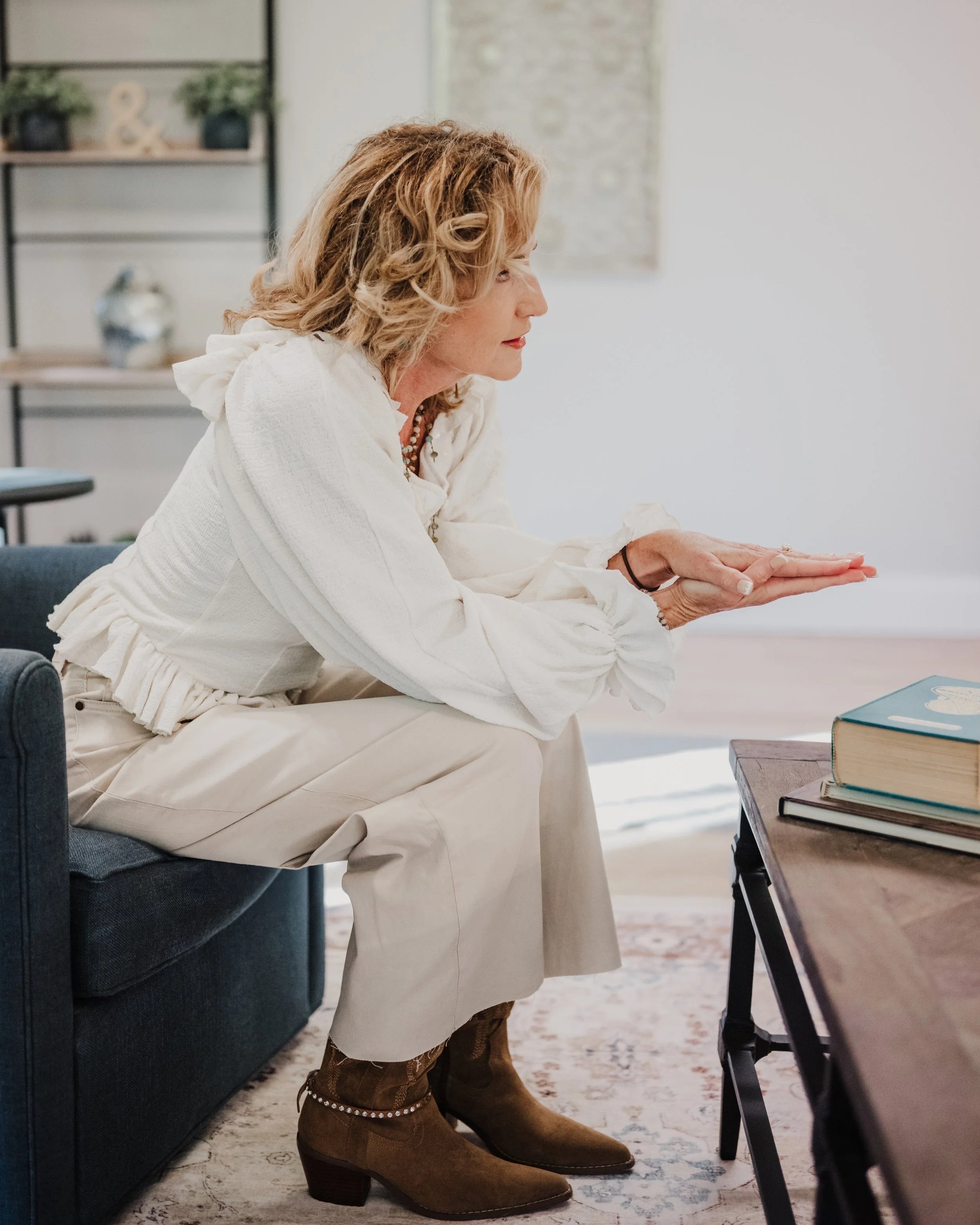 Female Therapist Casual. A calm and private therapy room in Batavia, IL, optimized for EMDR, hypnotherapy, and somatic healing sessions.