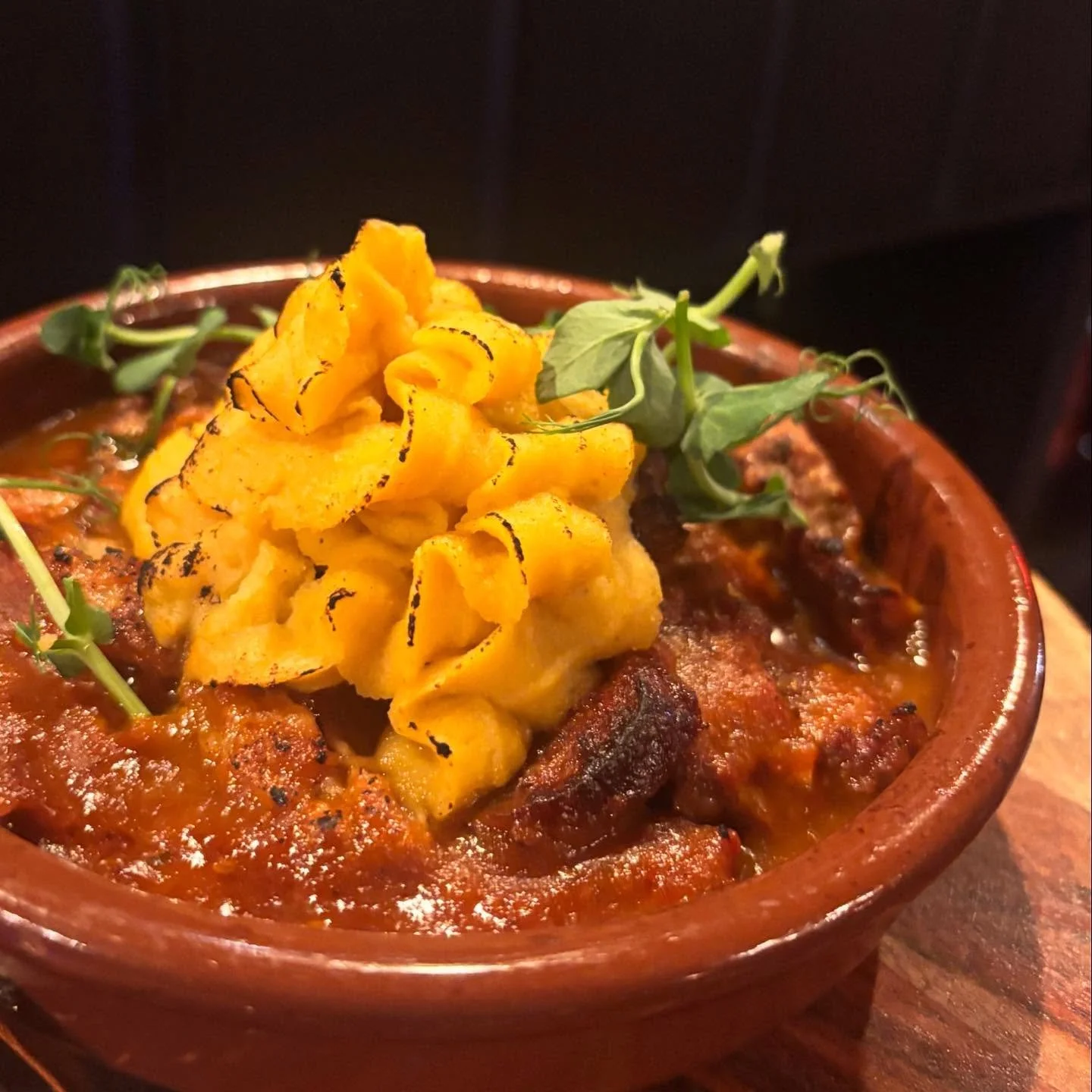 Lomo Asturiano 
Slow braised pork in saffron &amp; paprika, with chorizo &amp; rutabaga puree. 
💃🏻🪭💃🏻🪭💃🏻
🇪🇸🇪🇸🇪🇸🇪🇸
Matadora Tapas 
Authentic Spanish Tapas in the Heart of Victoria&rsquo;s Historic Chinatown.
559 Fisgard St 
Thu-Sun fro