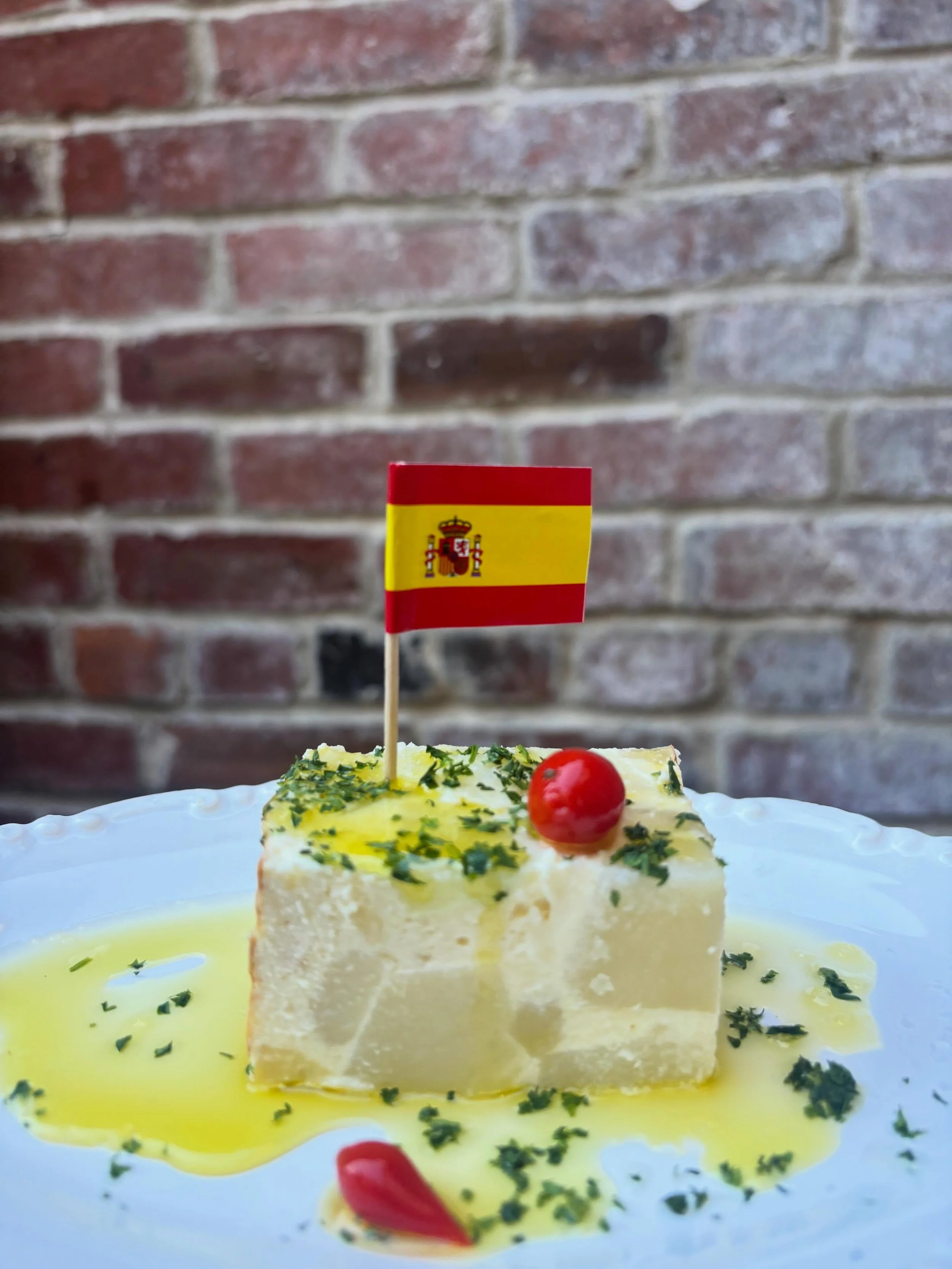 Tortilla De Queso 🇪🇸
One of our most popular menu items! A creamy basque twist on the traditional Spanish omelet of potato, eggs, onion and cheese. 
💃🏻🪭💃🏻🪭
Matadora Tapas 
Authentic Spanish Tapas 
in the Heart of Victoria, BC&rsquo;s Historic