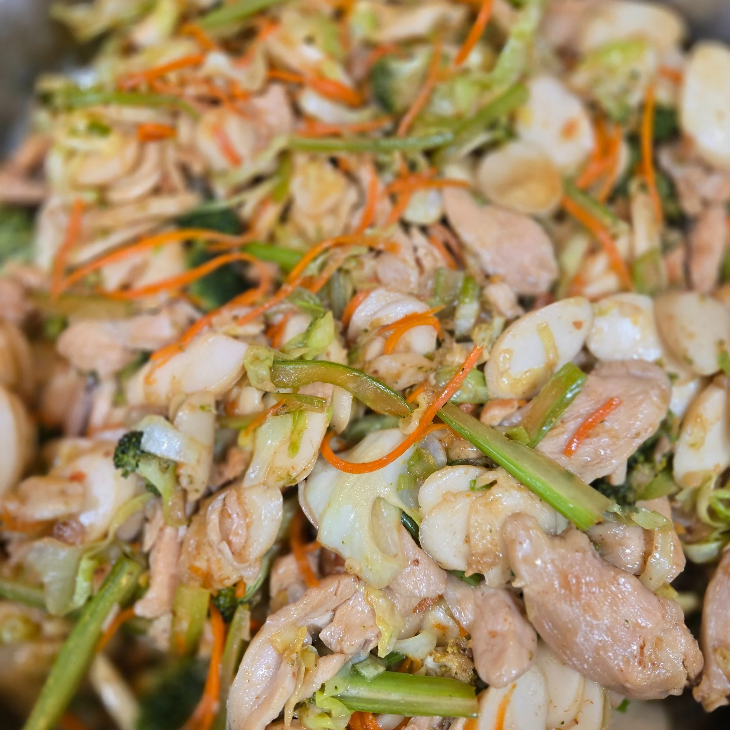 Rice cake stir fry. Use up veggies. Recipe first.

&bull; &bull; &bull;

- 1-2 lbs stir fry chicken
- 2 green onions
- 2-3 cloves garlic
- 1" piece ginger
- 1 pack sliced rice cakes
- 2 stalks celery
- 1 carrot
- 1/2 head cabbage
- Any other veg