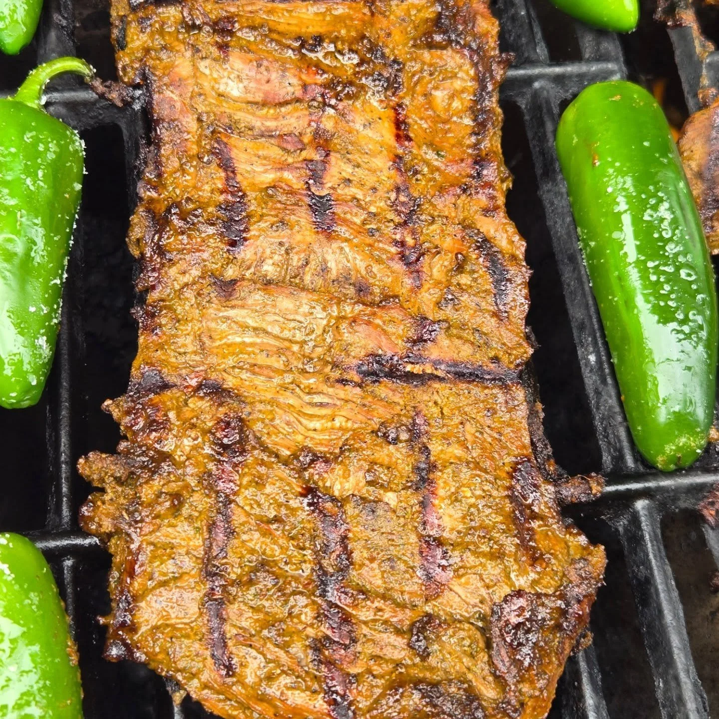Carne asada. Recipe first.

&bull; &bull; &bull;

2 lbs thin sliced steak
6 cloves garlic
1 orange, juiced
3 limes, juiced
3 tbsp maggi
1 bunch cilantro
4-5 dried ancho chiles
1/2 yellow onion
1/4 cup mirin
2 tbsp brown sugar
1 tbsp oregano
1 tbsp cu