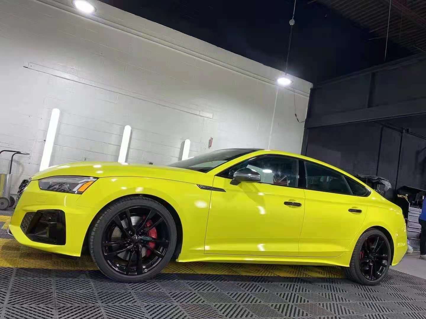 Audi RS5 wrapped in 3M Lucid Yellow