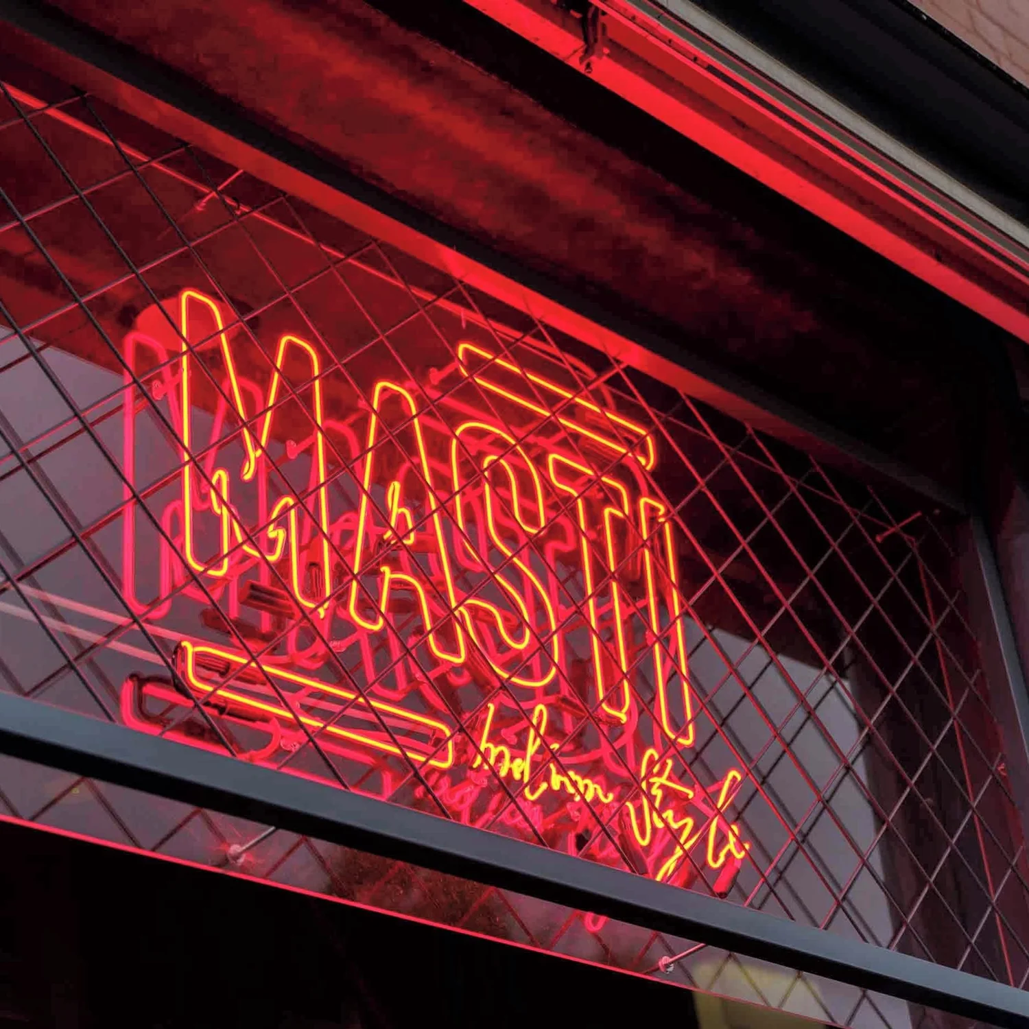 The red neon MASTI sign at Masti, Indian restaurant Fitzroy on Brunswick Street Melbourne