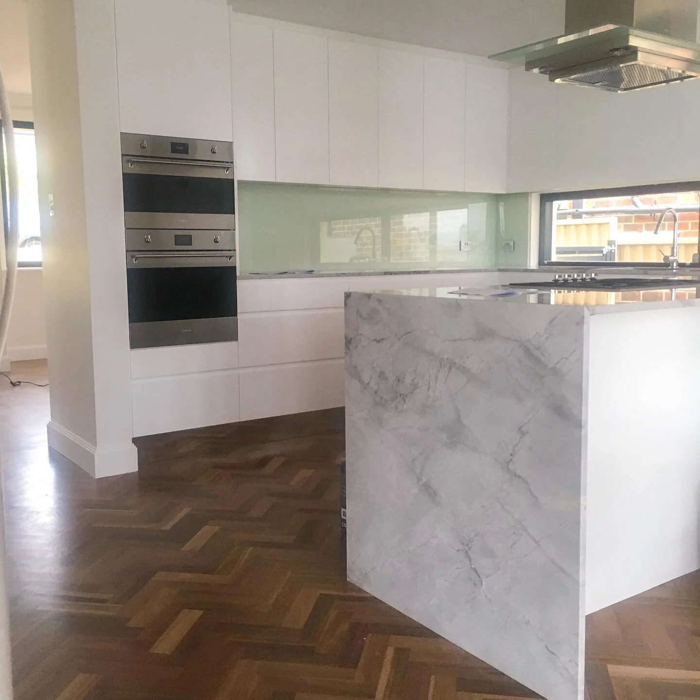 Beautiful home renovation in the Eastern Suburbs. Modern kitchen, unique black framing and curved walls all impeccably finished by the team.