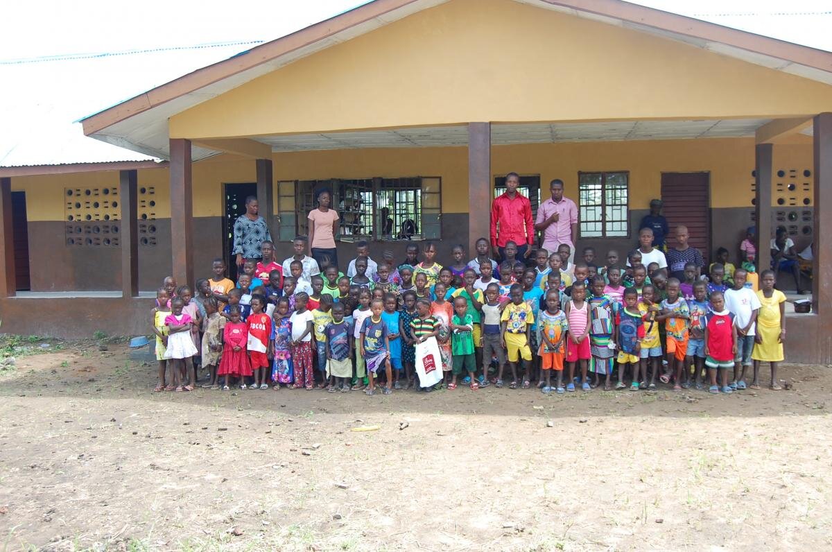 Students on the first day of school at Three Communities Primary School