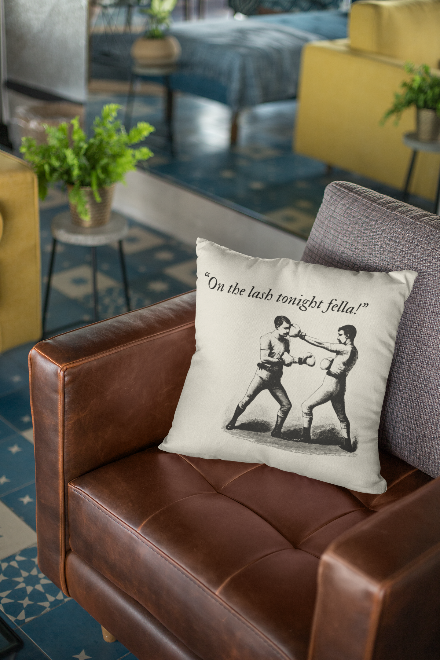 throw-pillow-mockup-lying-over-a-retro-leather-couch-23555.png