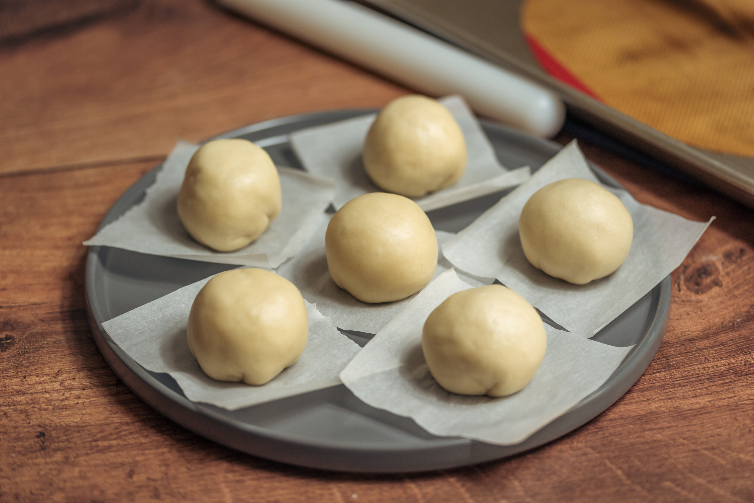 Before the buns have proofed.