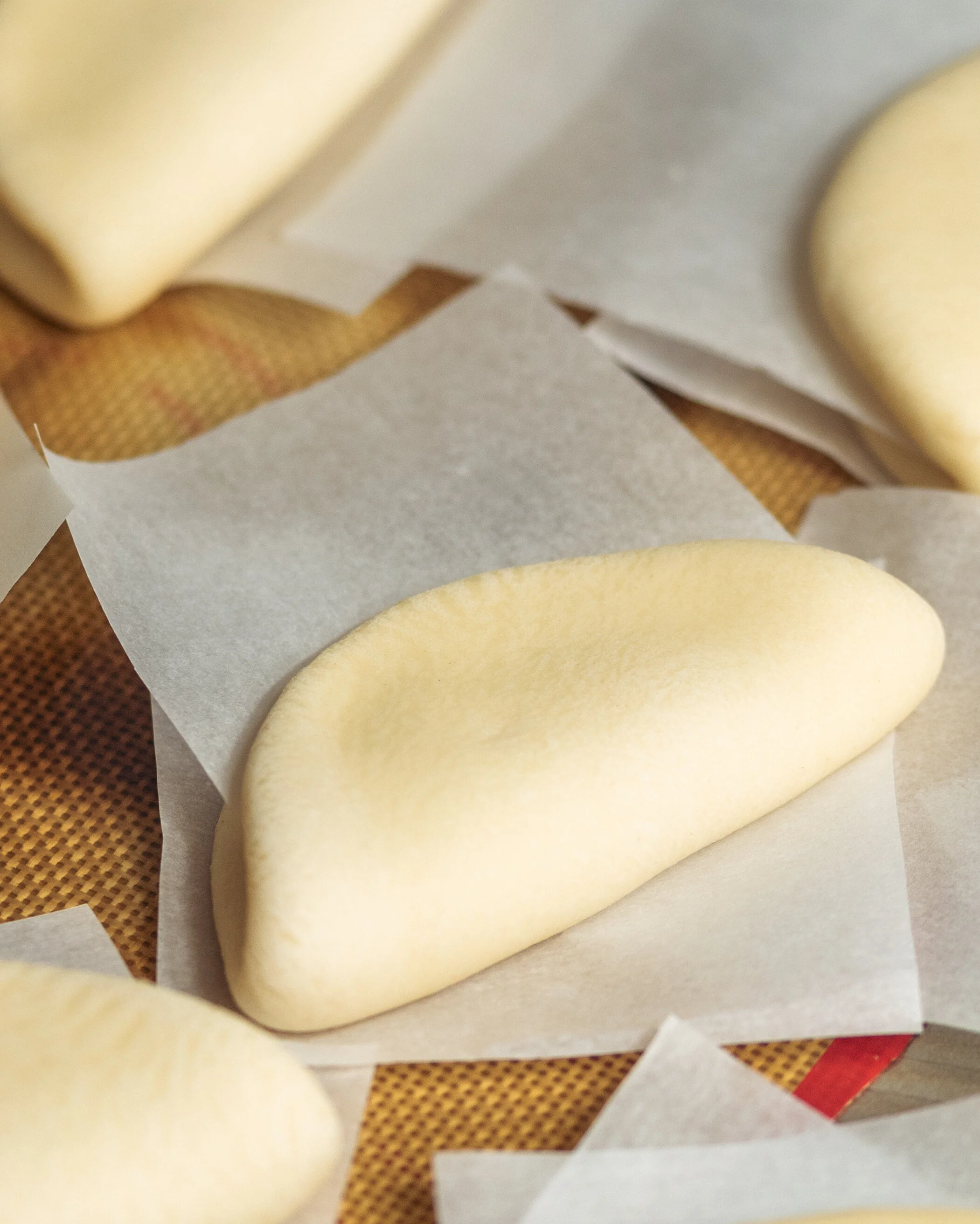 Place a piece of parchment on one 1/2, fold over.
