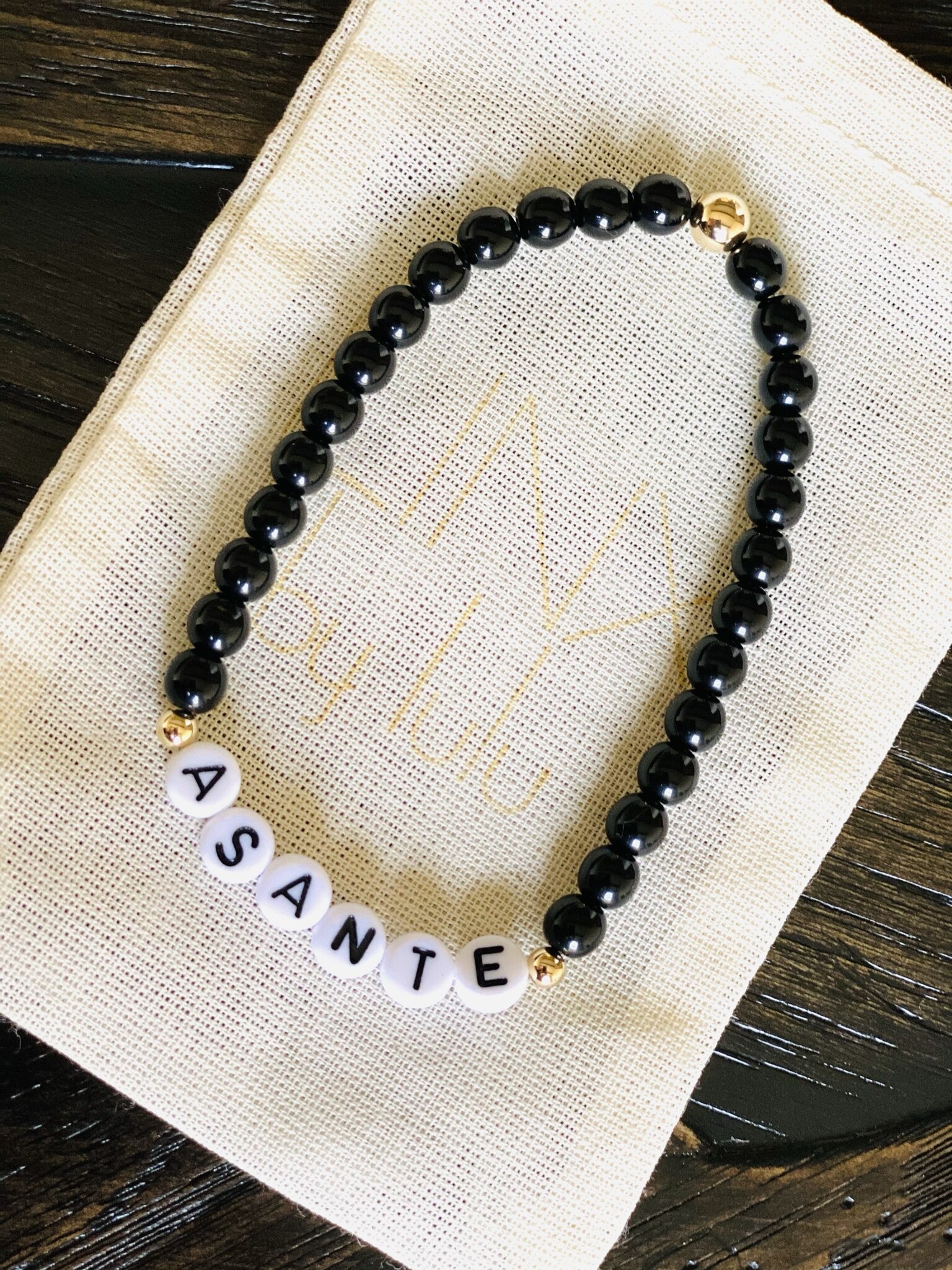 Our asante black onyx personalized bracelet at an angle.