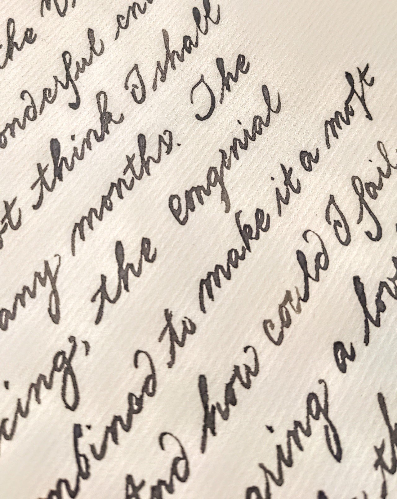 A letter in Regency round hand written with a quill and oak gall ink