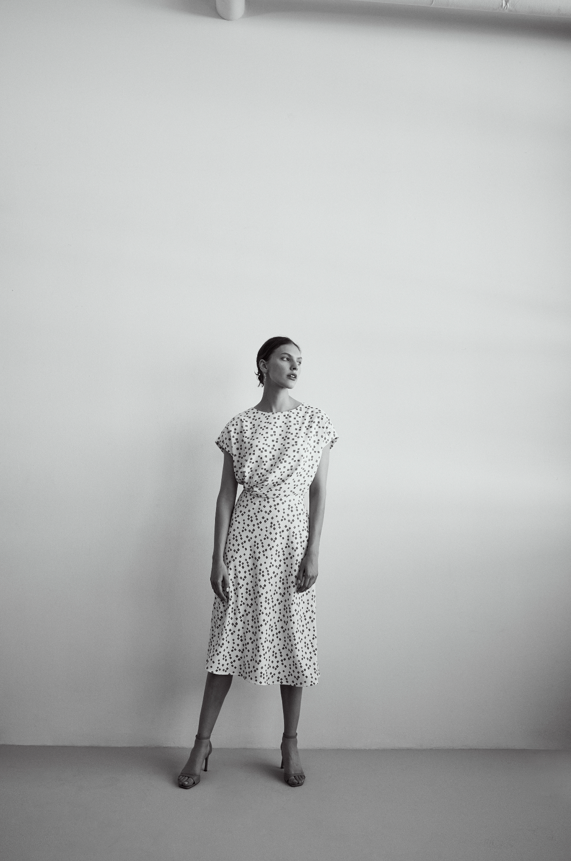 Women's luxury fashion creative direction black and white imagery on film