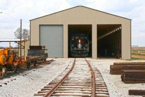 With two tracks now operational, material gathers to complete the third track.